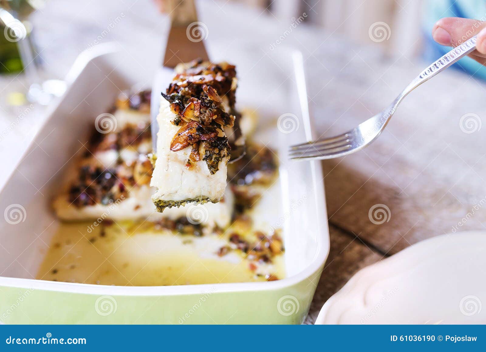Man serving fish stock photo. Image of detail, board 61036190