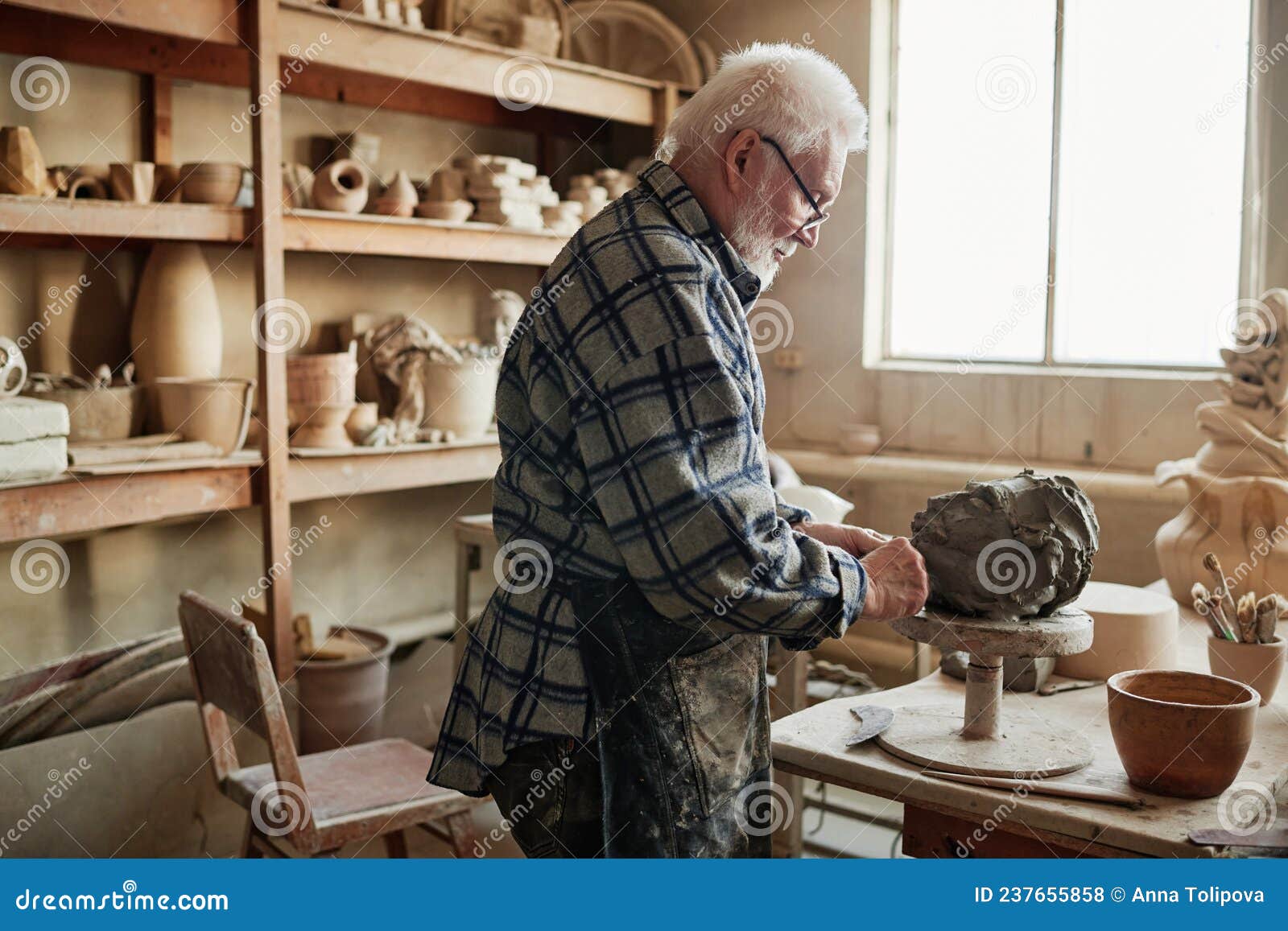 Man Shaping Clay Sculpture in the Studio Stock Photo Image of