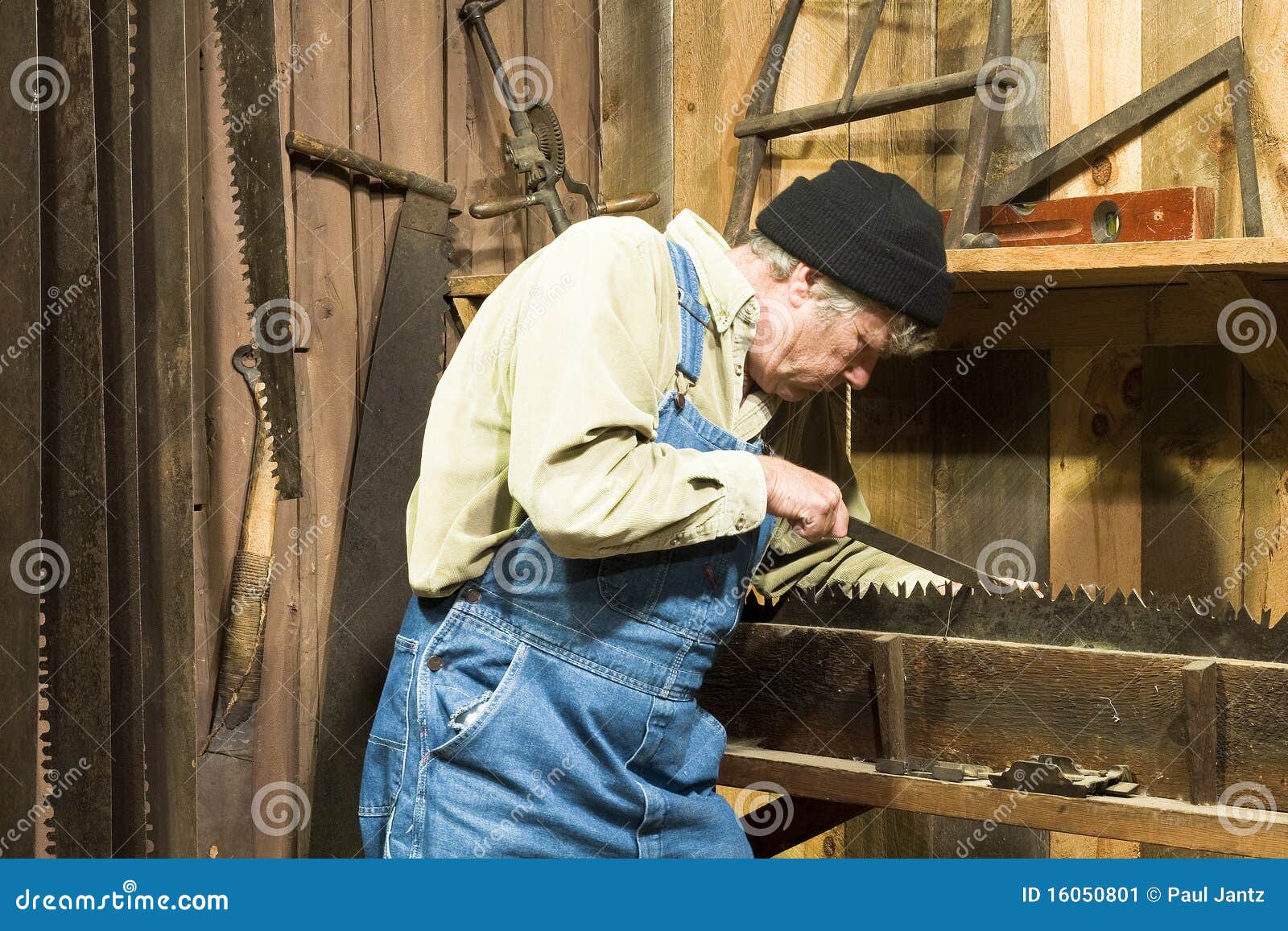 Man Sharpening An Old Saw Stock Image - Image: 16050801