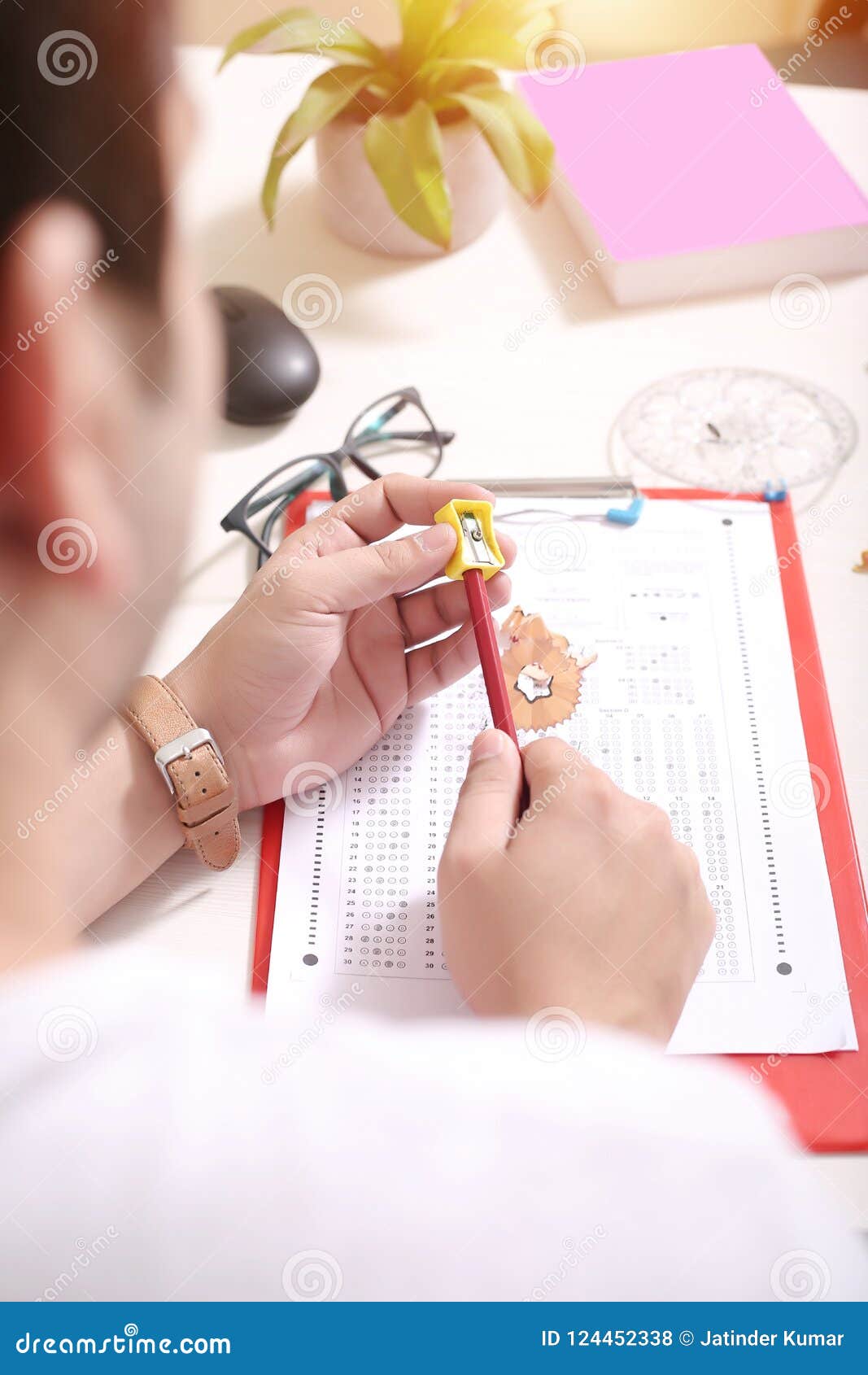 Man Sharpening Pencil with the Help of Sharpener Stock Photo Image of