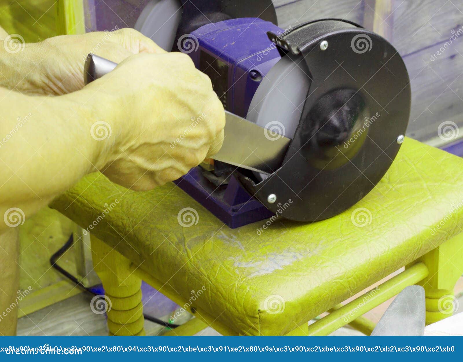 A Man Sharpens a Knife on a Grinding Wheel Stock Image Image of blow