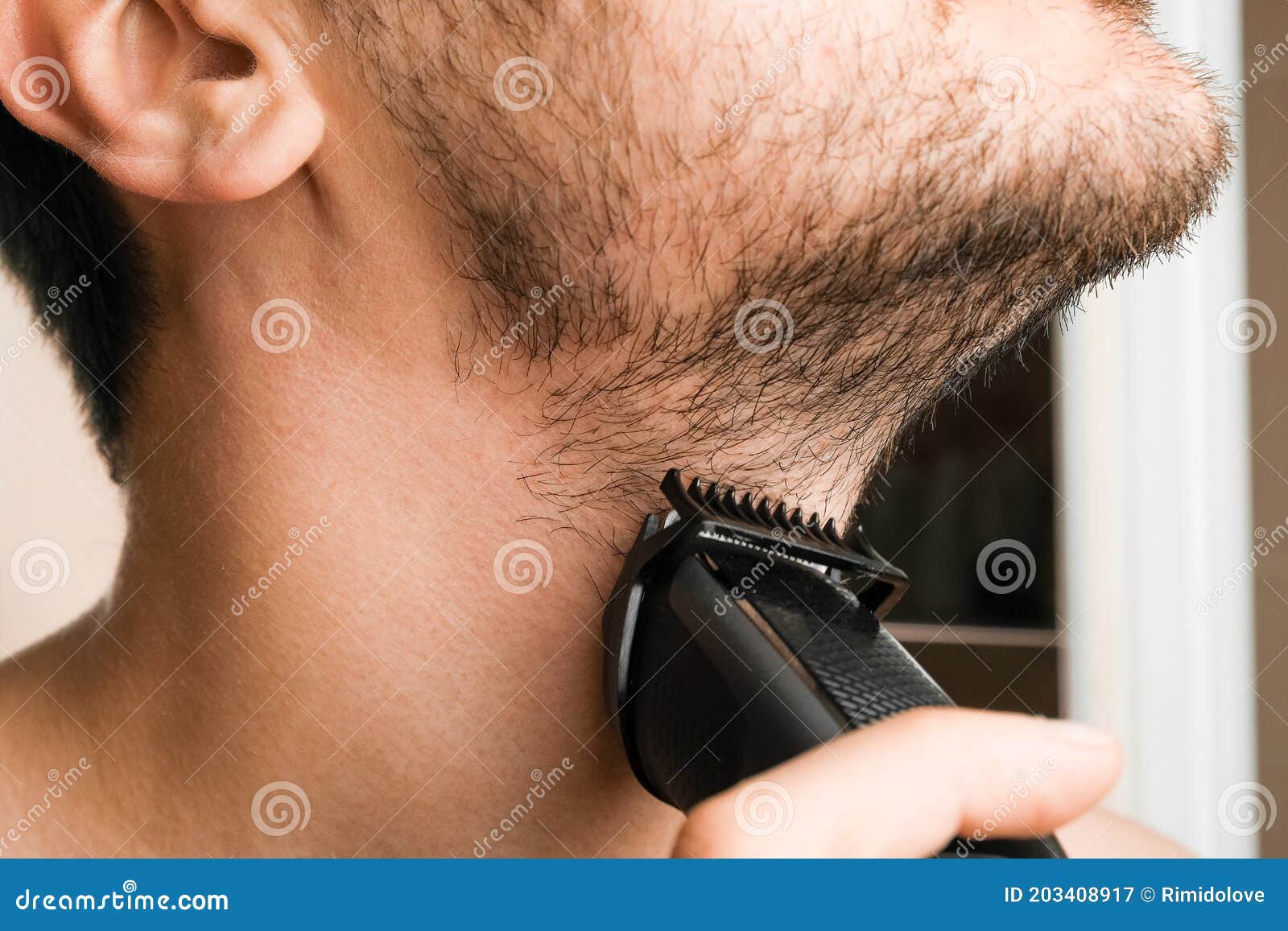 trimming beard with electric razor