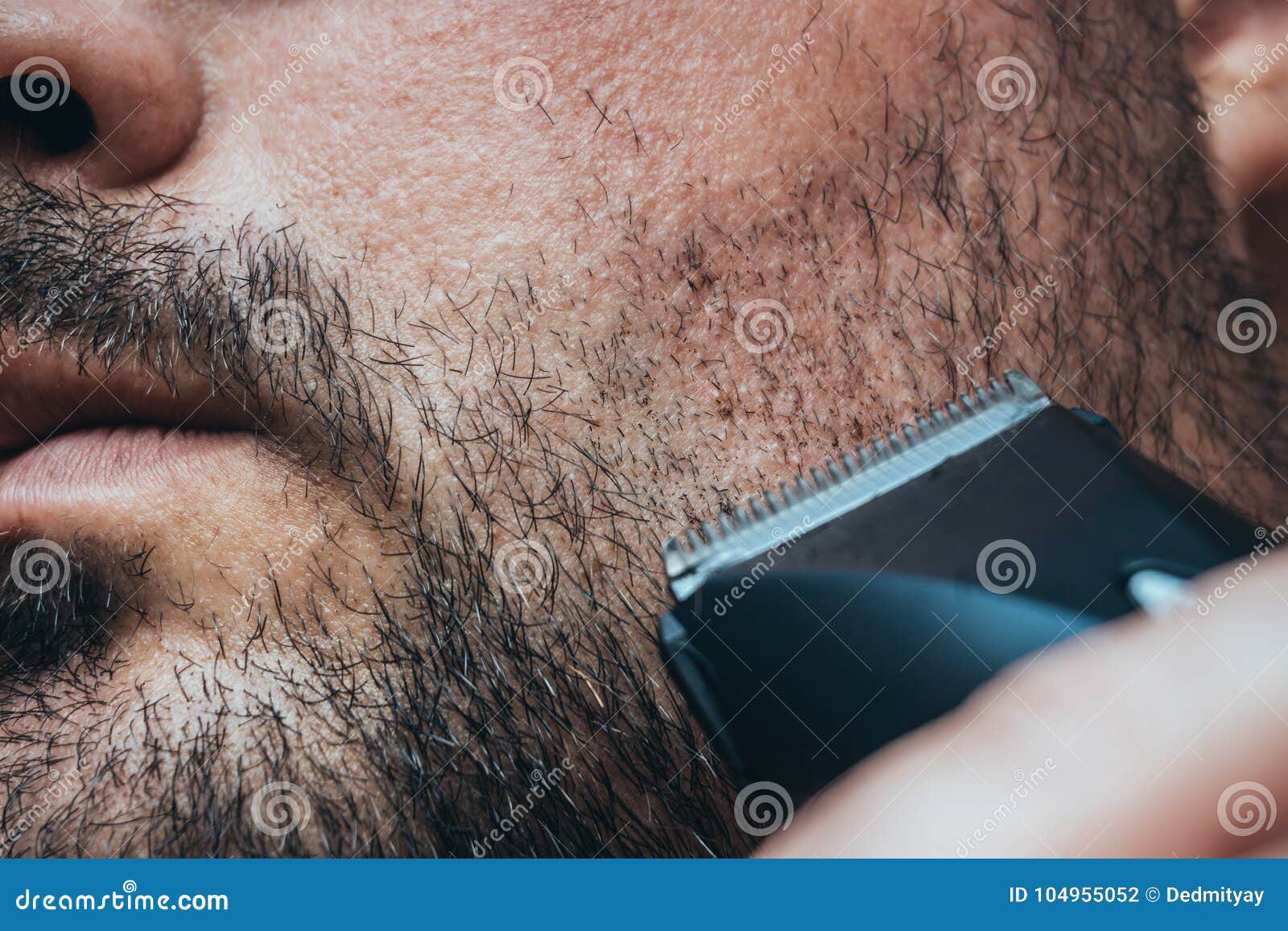 shaving beard with hair clippers