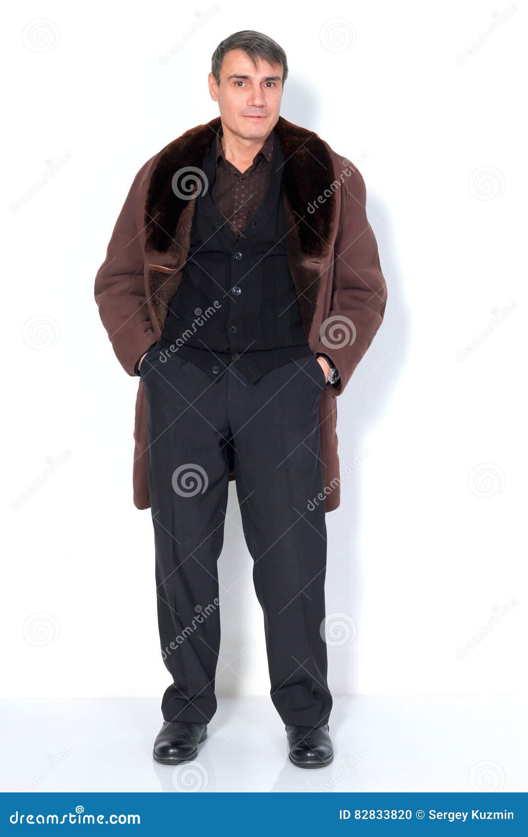 A man in a sheepskin coat. stock photo. Image of handsome - 82833820