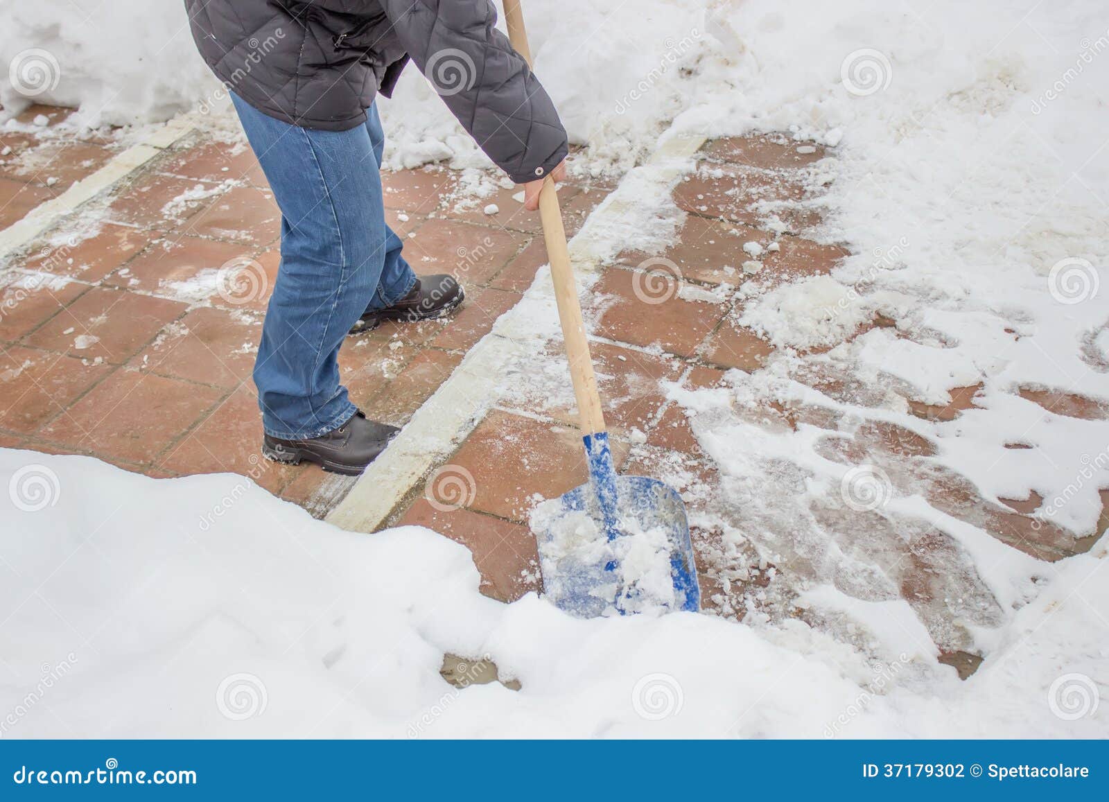 Man Shovelling Snow from the Sidewalk 5 Stock Photo Image of human