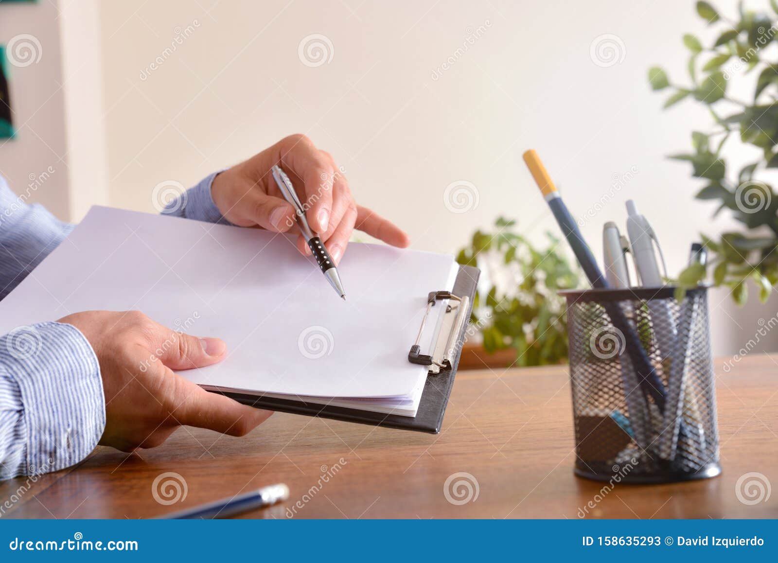 Man Showing Blank Sheet of Paper Side View Stock Image - Image of