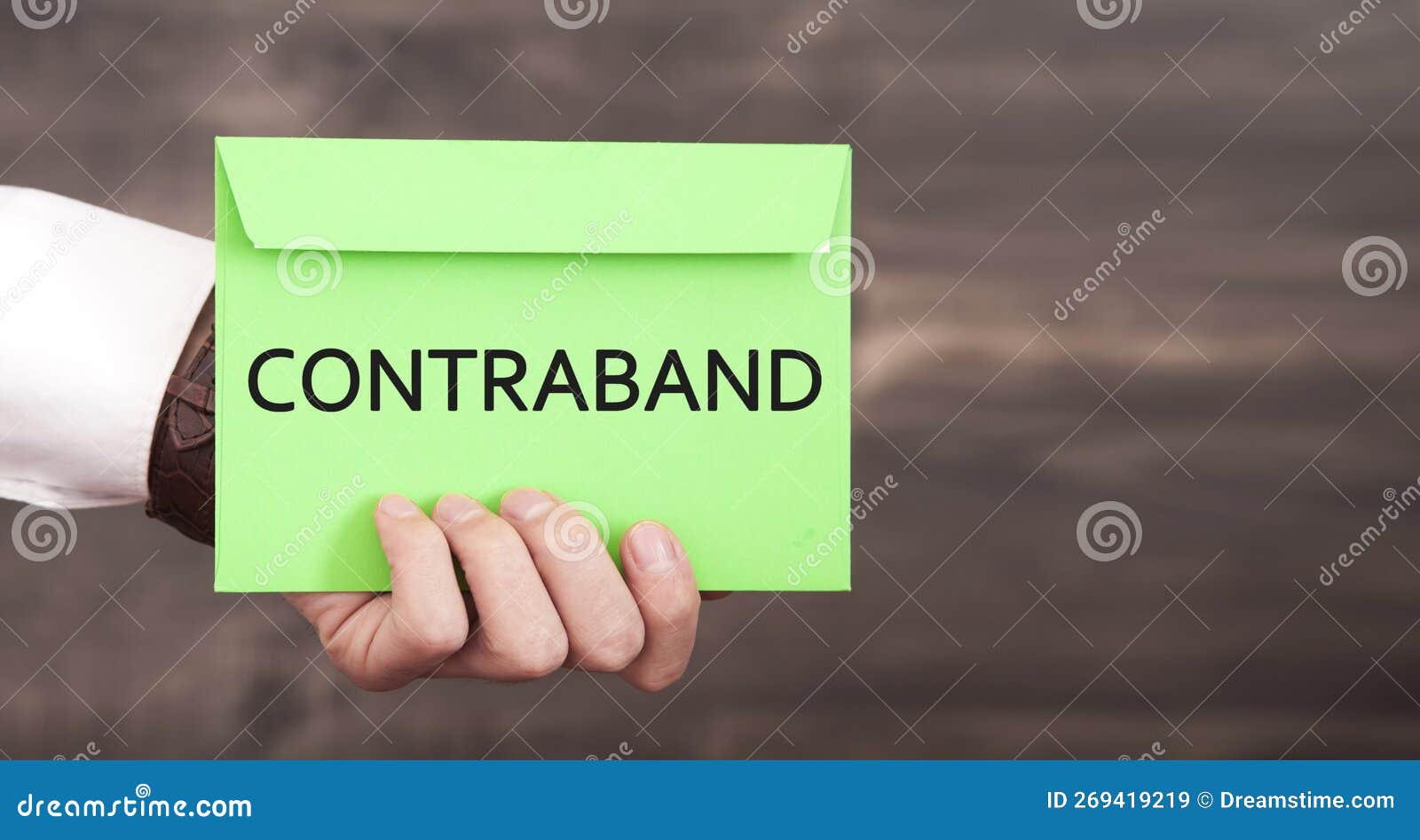 man showing contraband word on paper