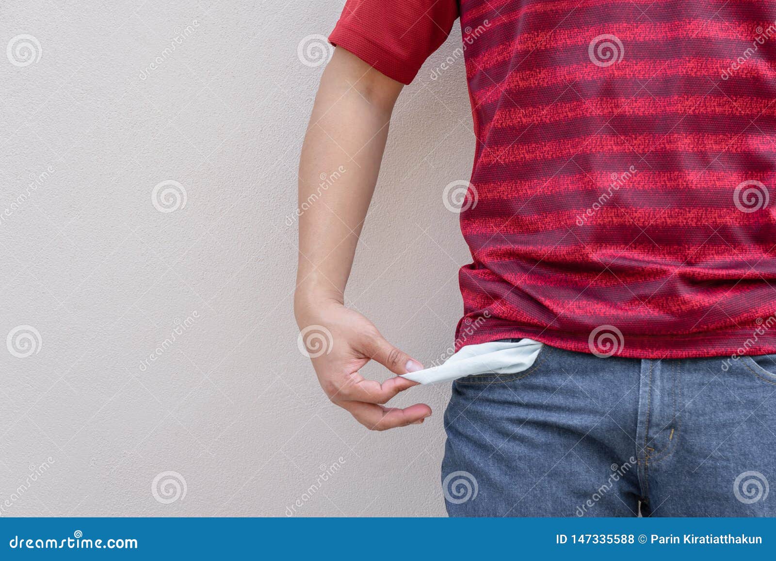 Man Showing His Empty Pocket on Wall. Stock Photo Image of hipster