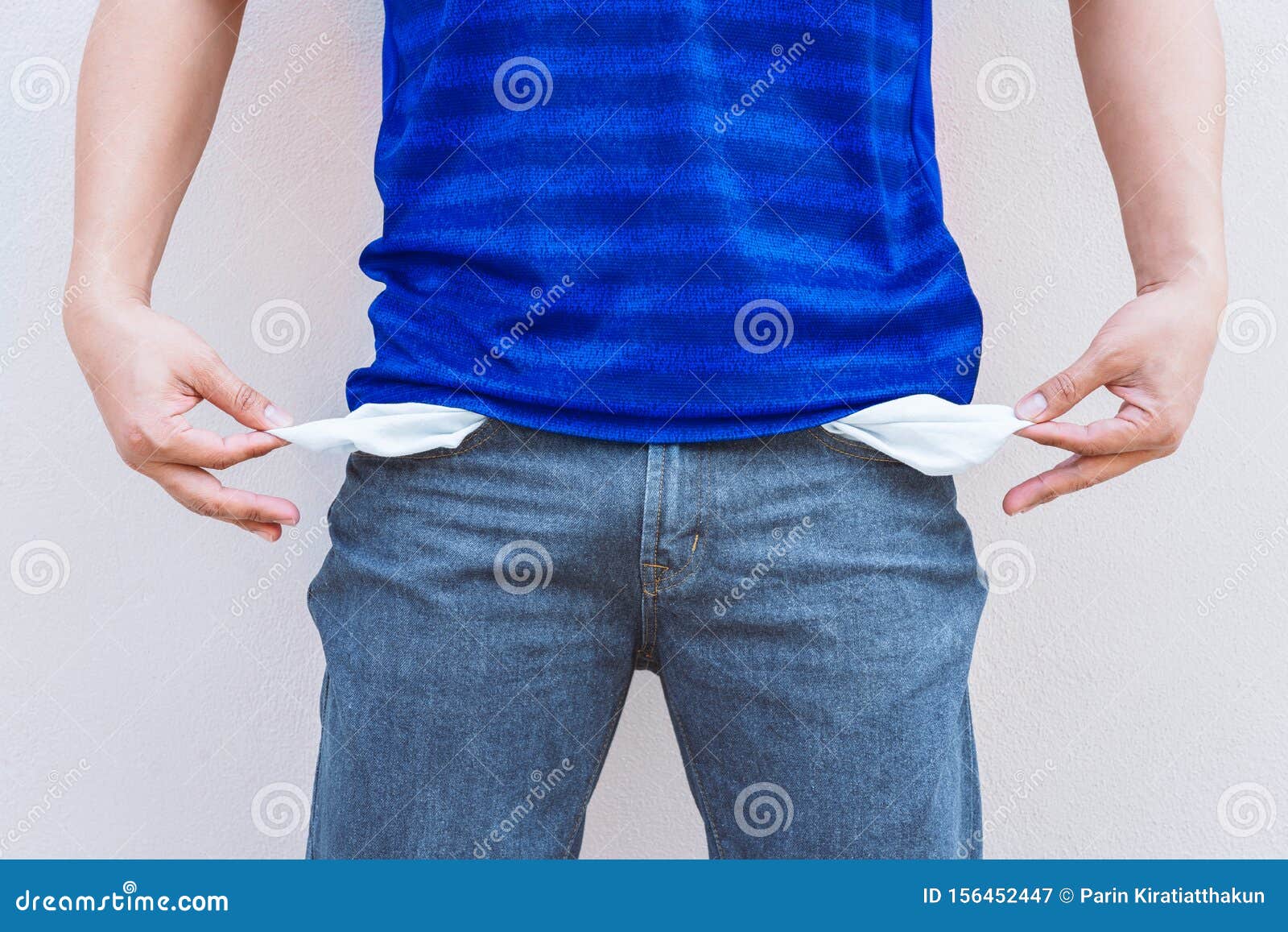 Man Showing His Empty Pocket on Wall Background Stock Image Image of