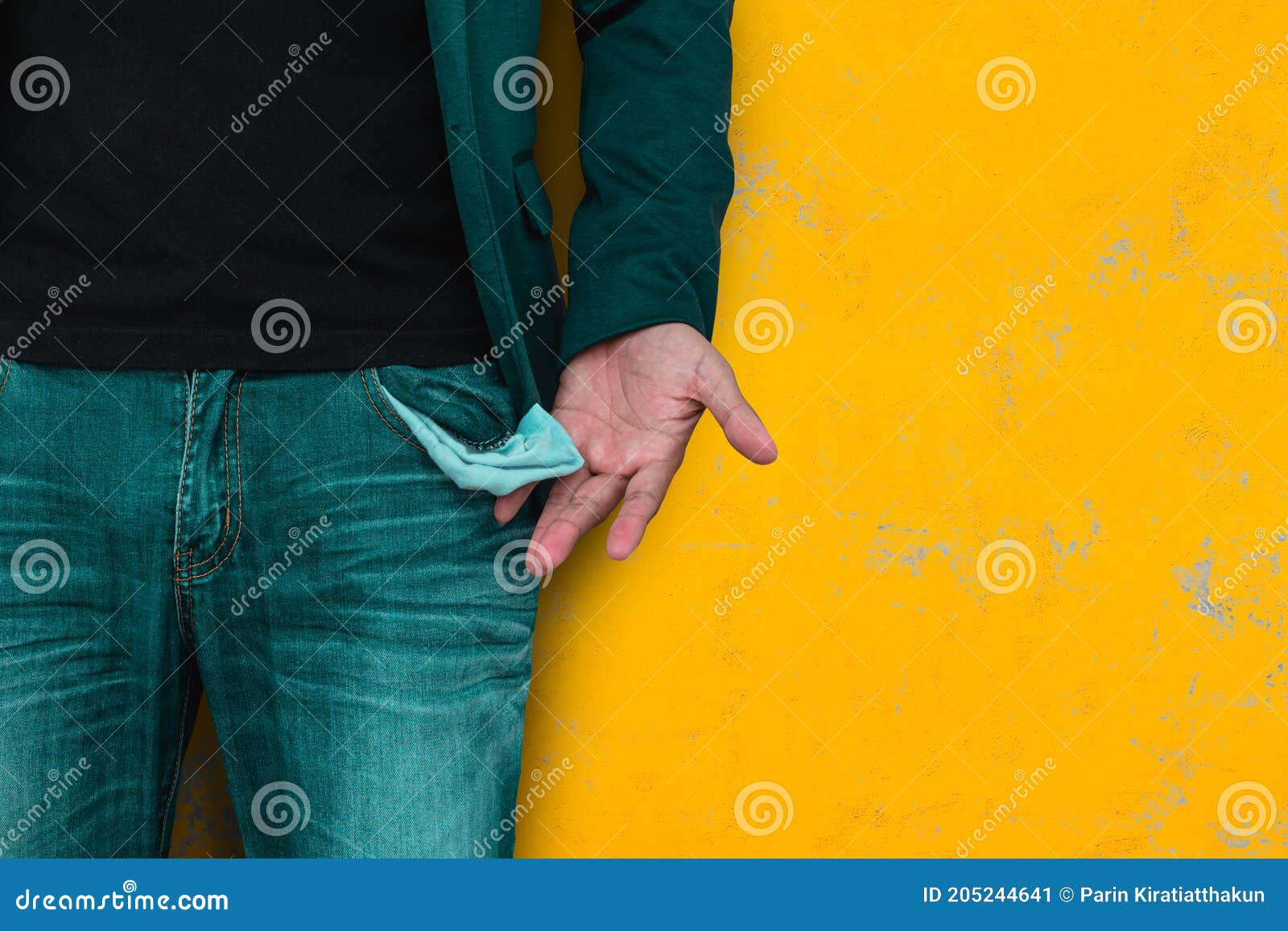 Man Showing His Empty Pocket on Yellow Wall. Stock Image Image of