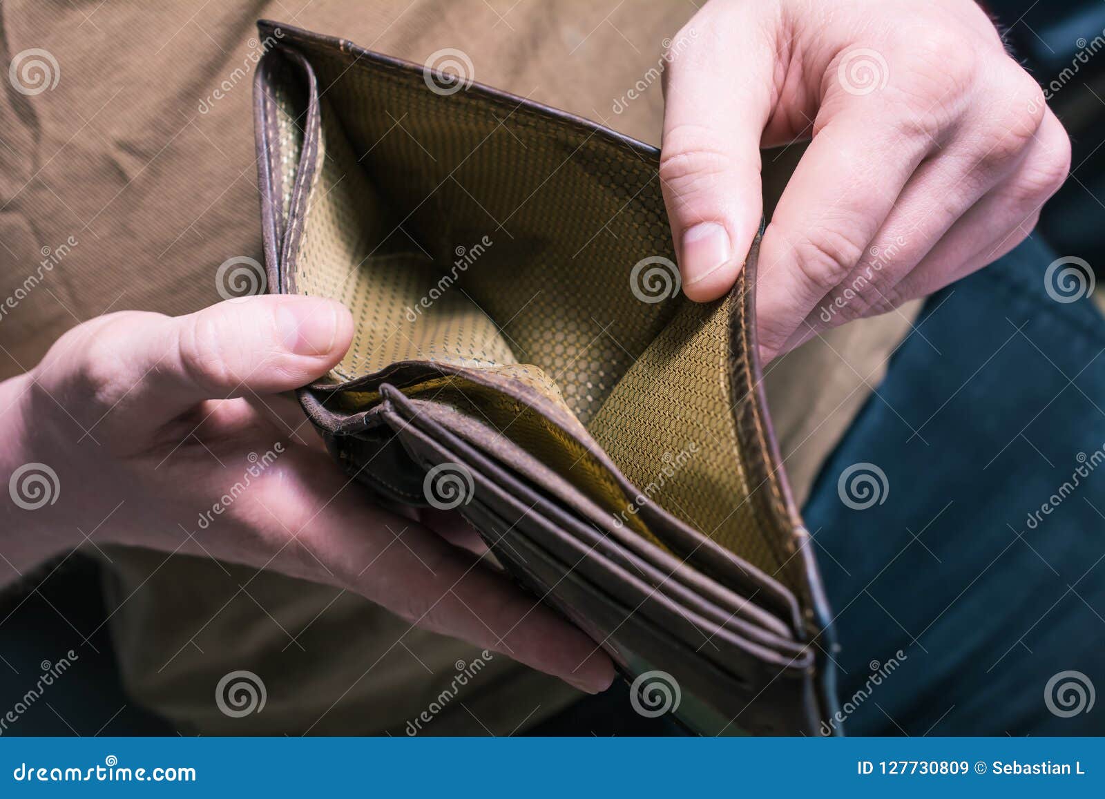 Man Showing His Empty Wallet No Money Left Concept Stock Image
