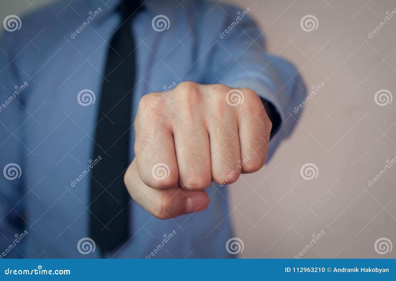 man showing punch.