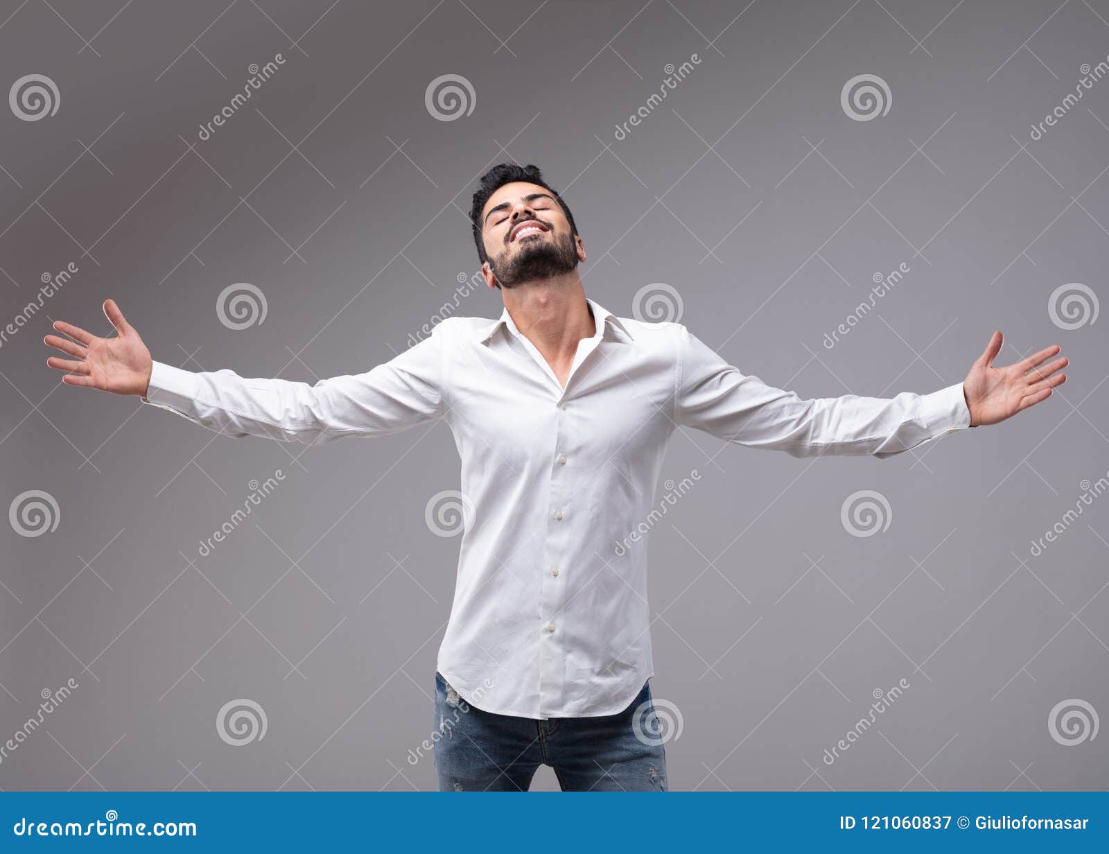 man showing relieved gesture with spread arms