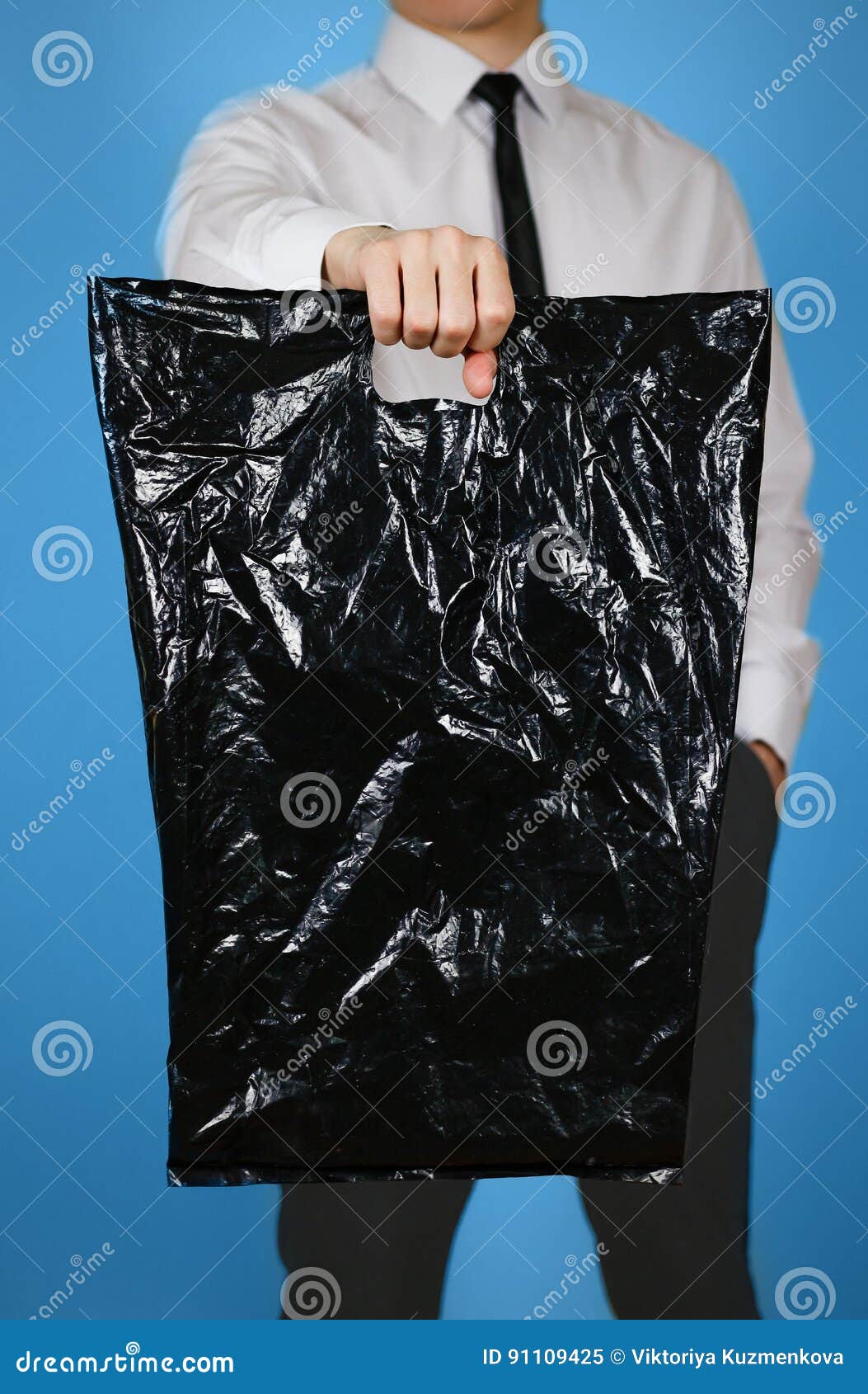 Download Man Shows Black Blank Plastic Bag Mock Up . Empty White ...