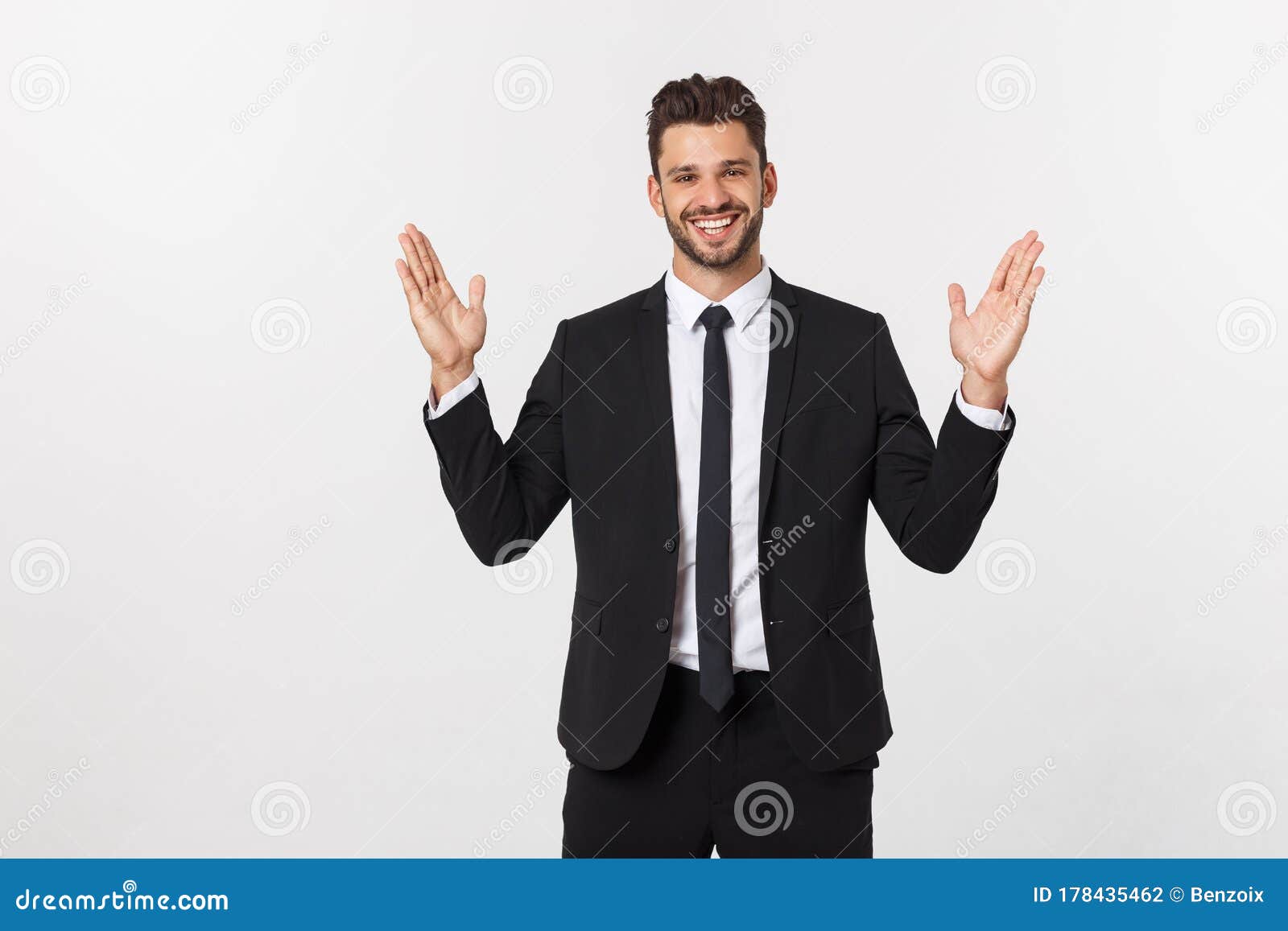 A Man Shows with His Hands a Large Size on an Isolated Background Stock ...