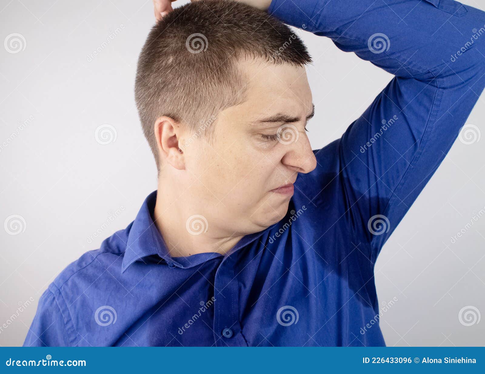 The Man Shows His Sweaty Armpits To The Camera Close Up Of Sweat Drops