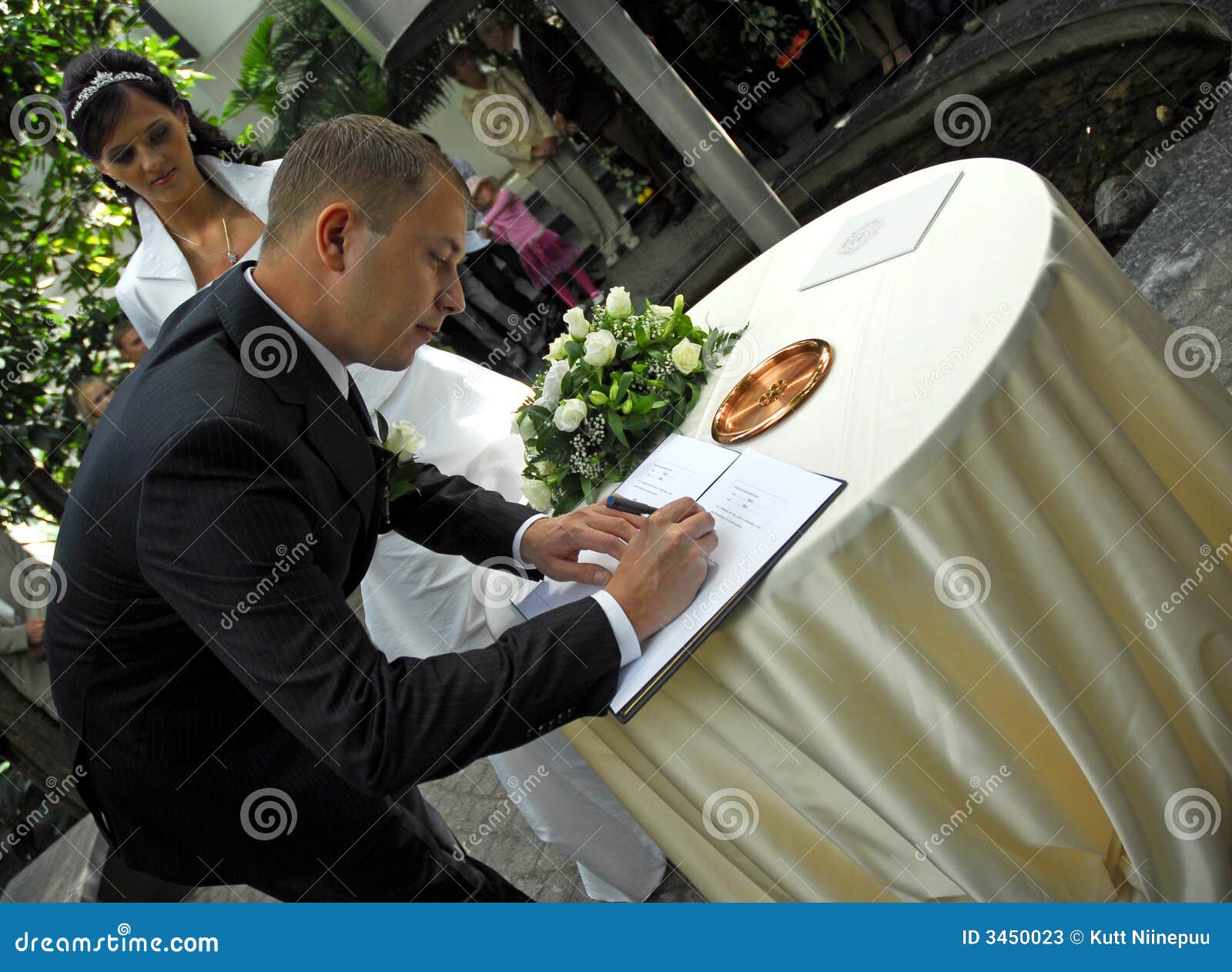 Man signing wedding papers stock image. Image of bridal 3450023