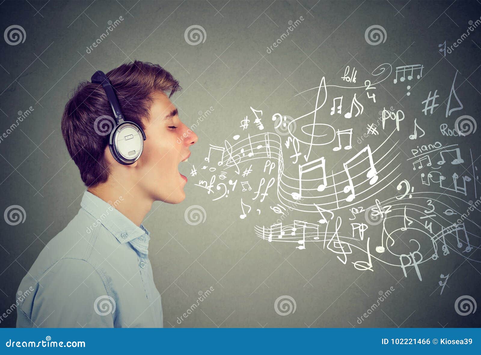 Young Man Singing with Music Notes Coming Out of Mouth Stock Photo