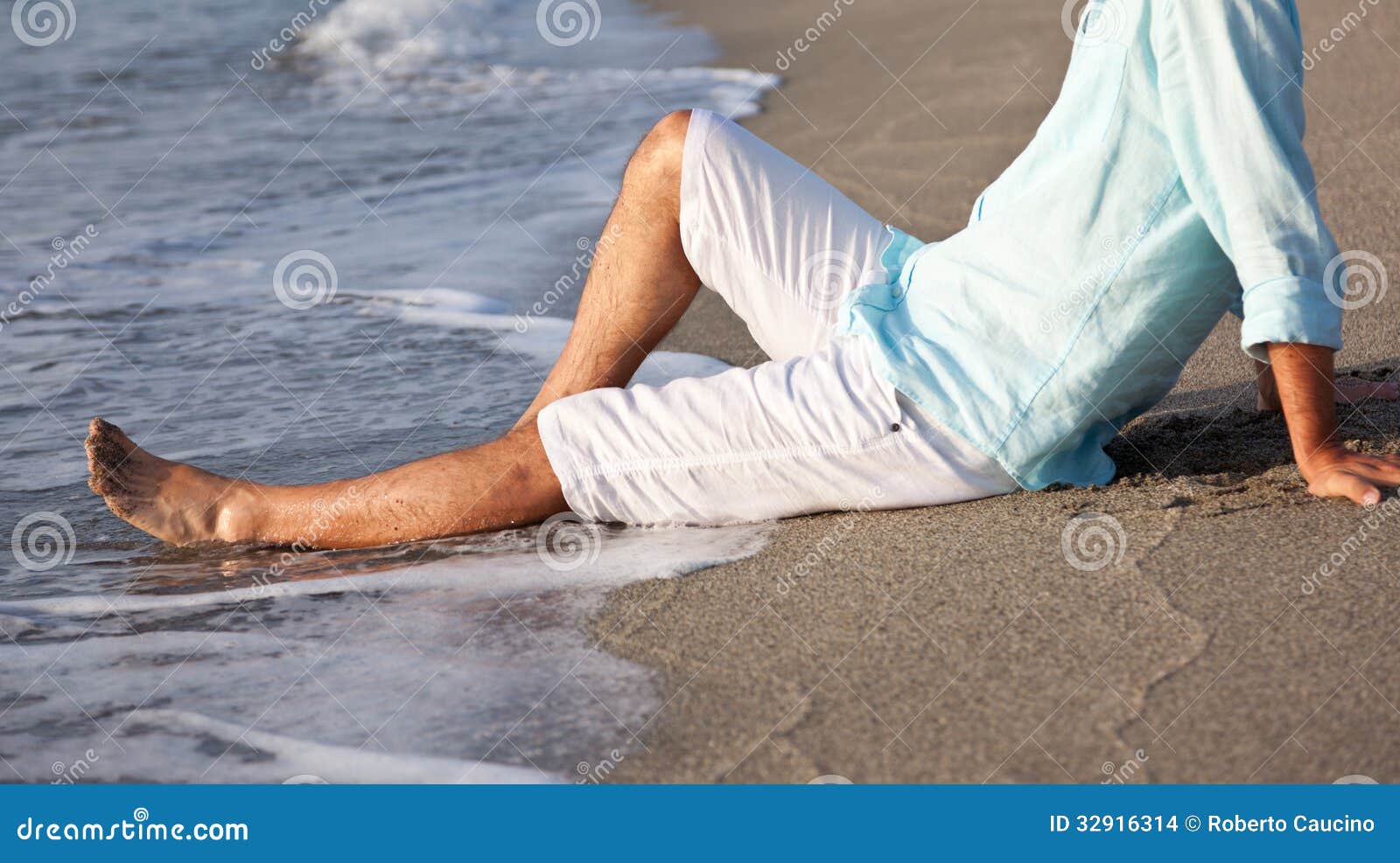 Man Sitting on Beach in the Sunrise Light. Stock Photo - Image of  enjoyment, barefoot: 32916314