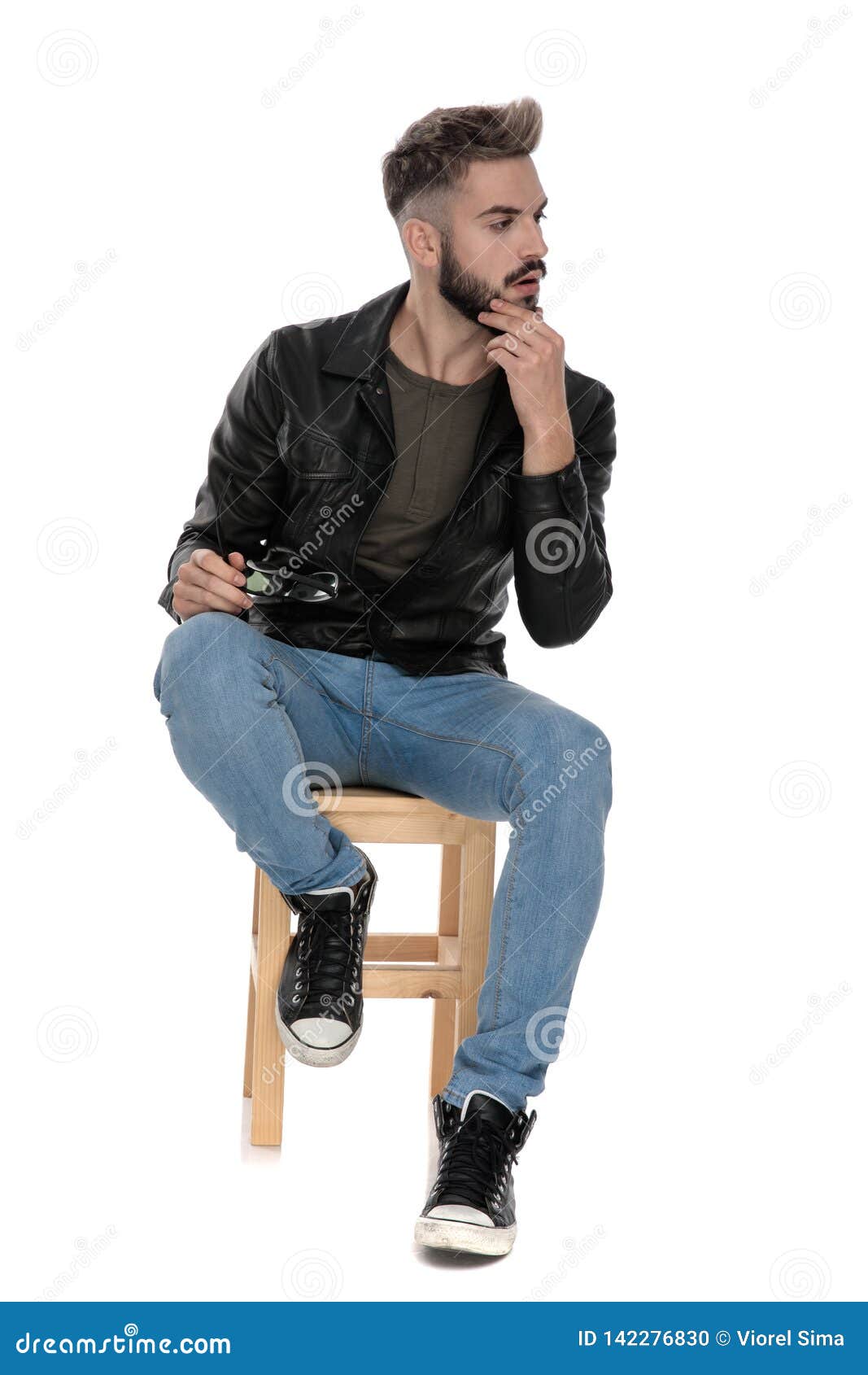 Man Sitting on Chair and Thinking with Hand on Chin Stock Photo - Image ...