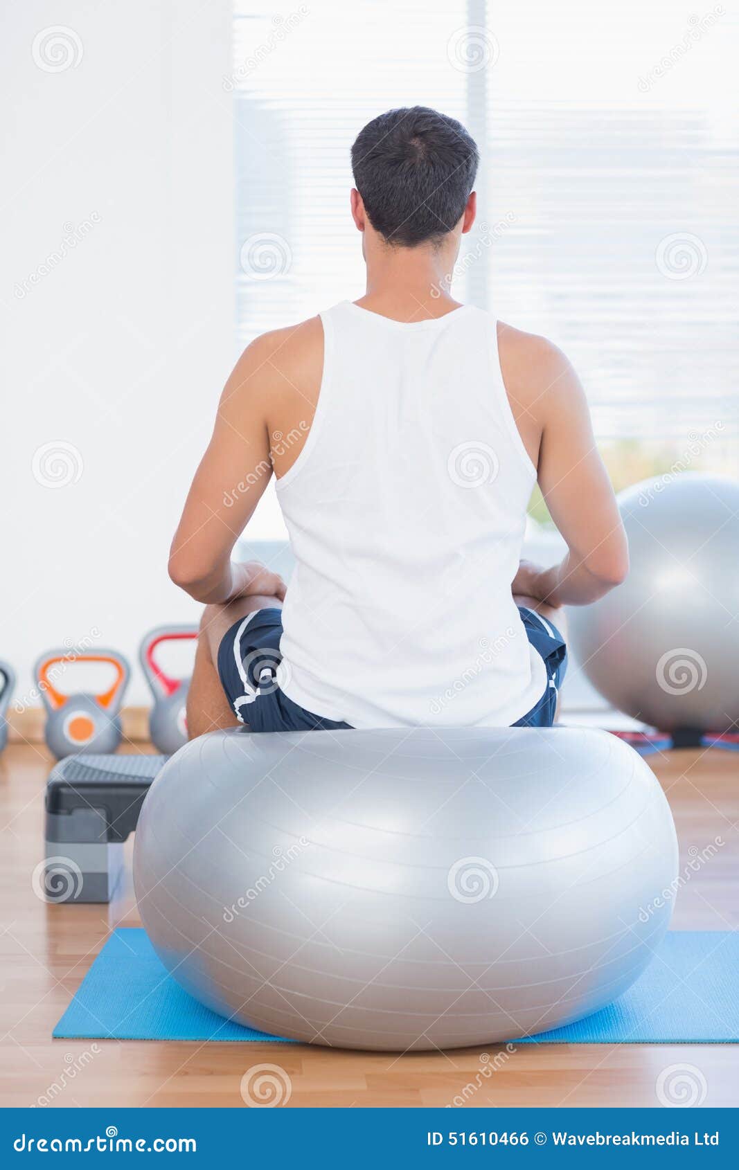sitting on gym ball