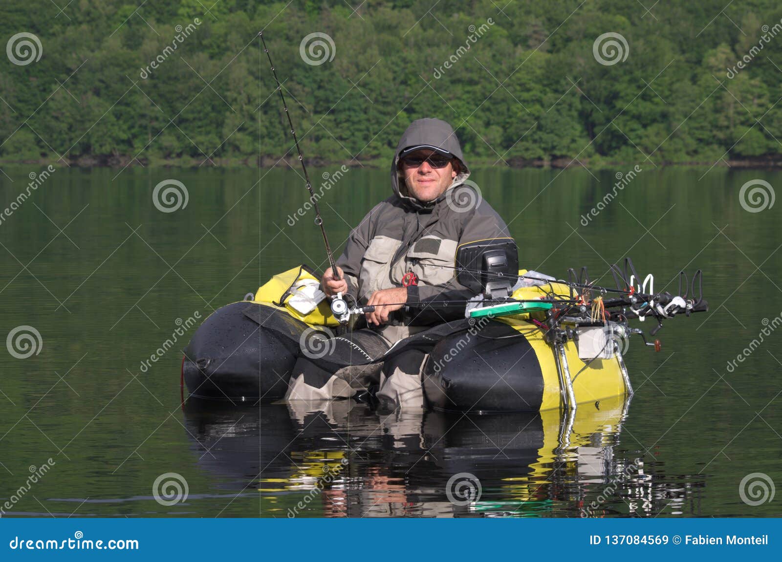 Fishing with a float tube stock image. Image of leisure - 137084569