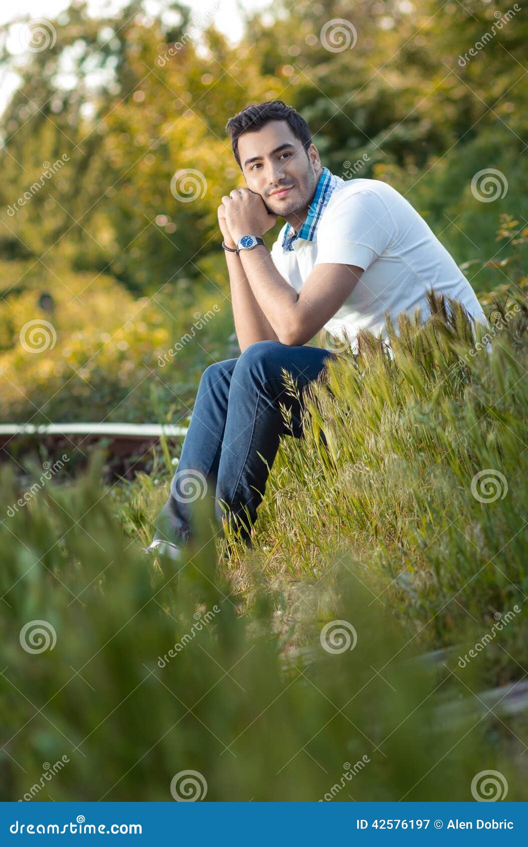 Man Sitting on Grass in Forest Stock Image - Image of relax, daylight ...