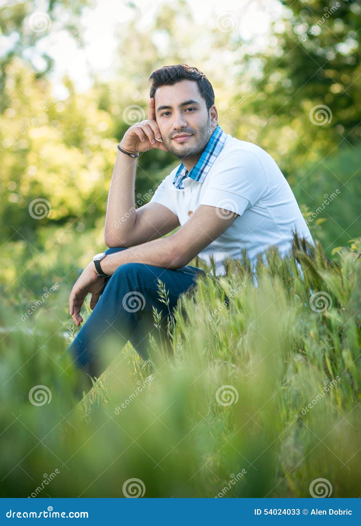 Man Sitting on Grass in Forest Stock Image - Image of grass, beautiful ...