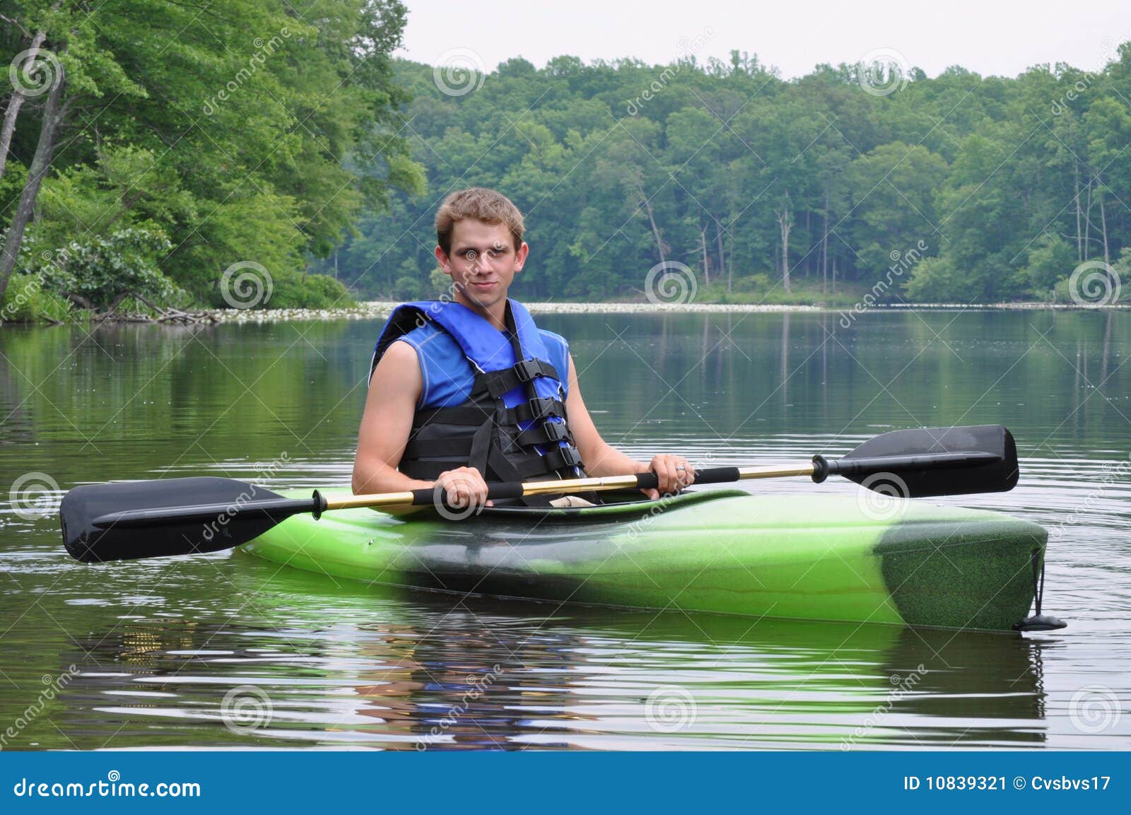 Man Sitting in Kayak stock image. Image of canoe, girl ...