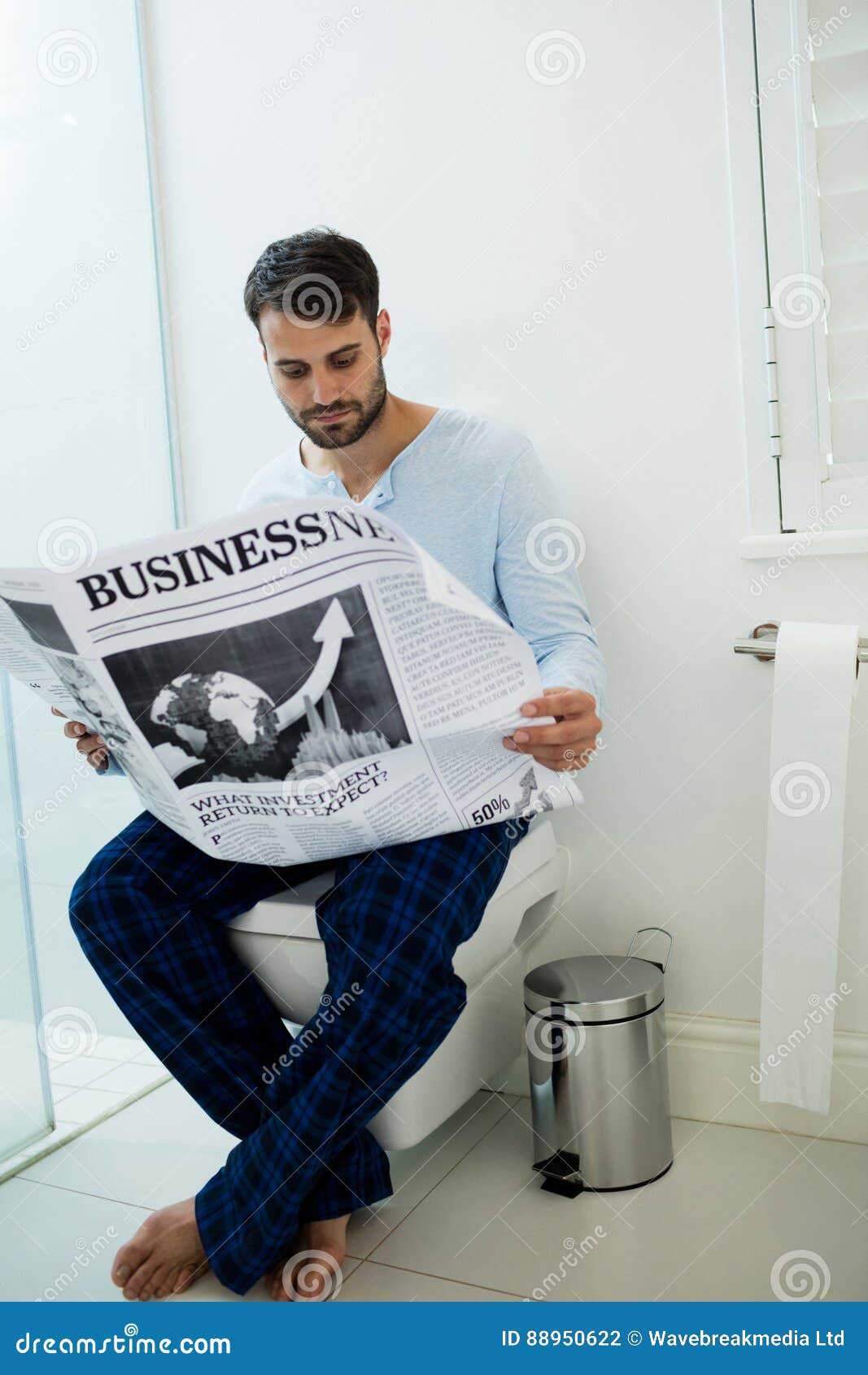 Close Up View Of Man Reading Newspaper While Sitting On 