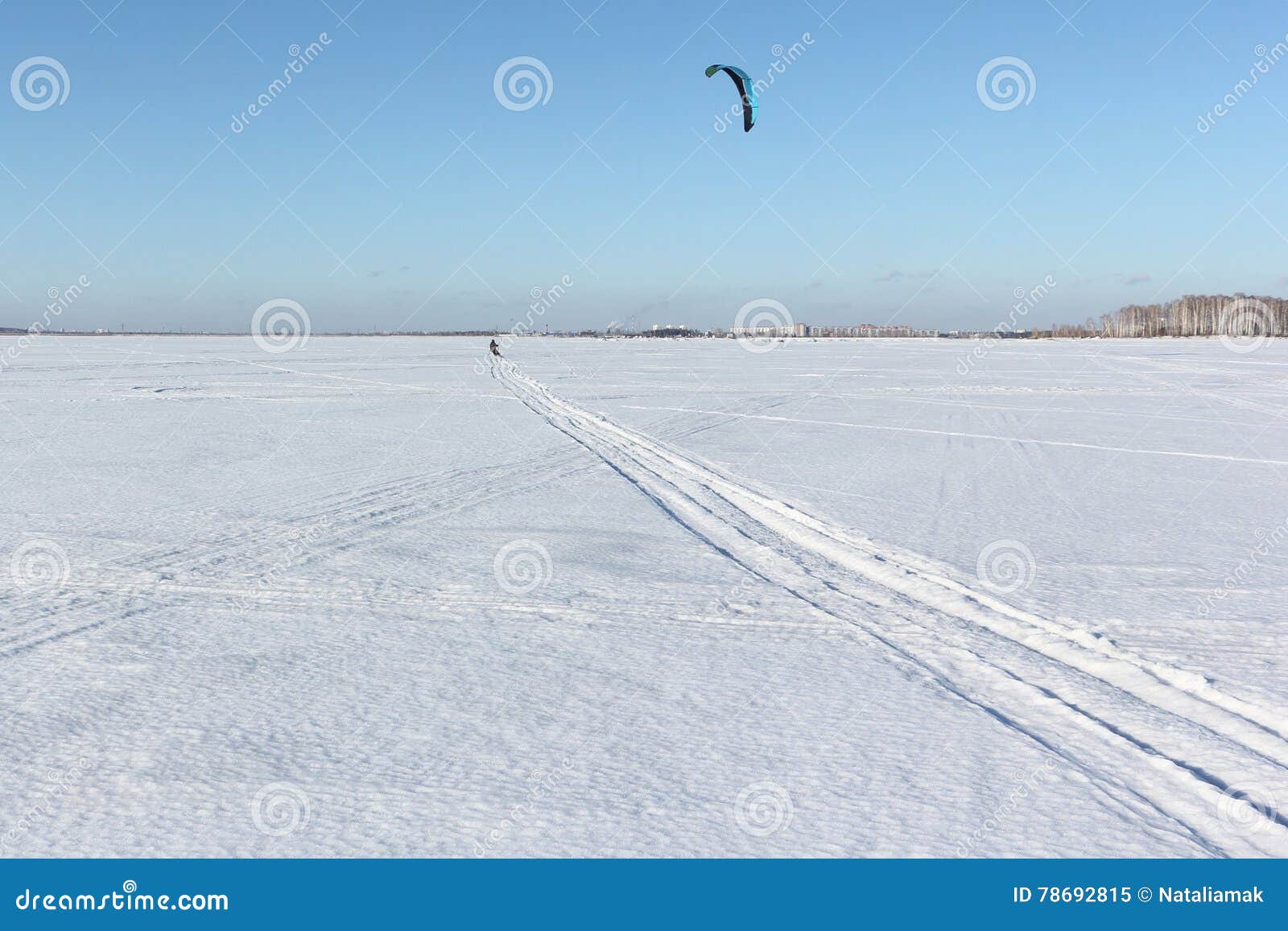 The Man Skiing with a Parachute on a Snow Field Stock Image Image of