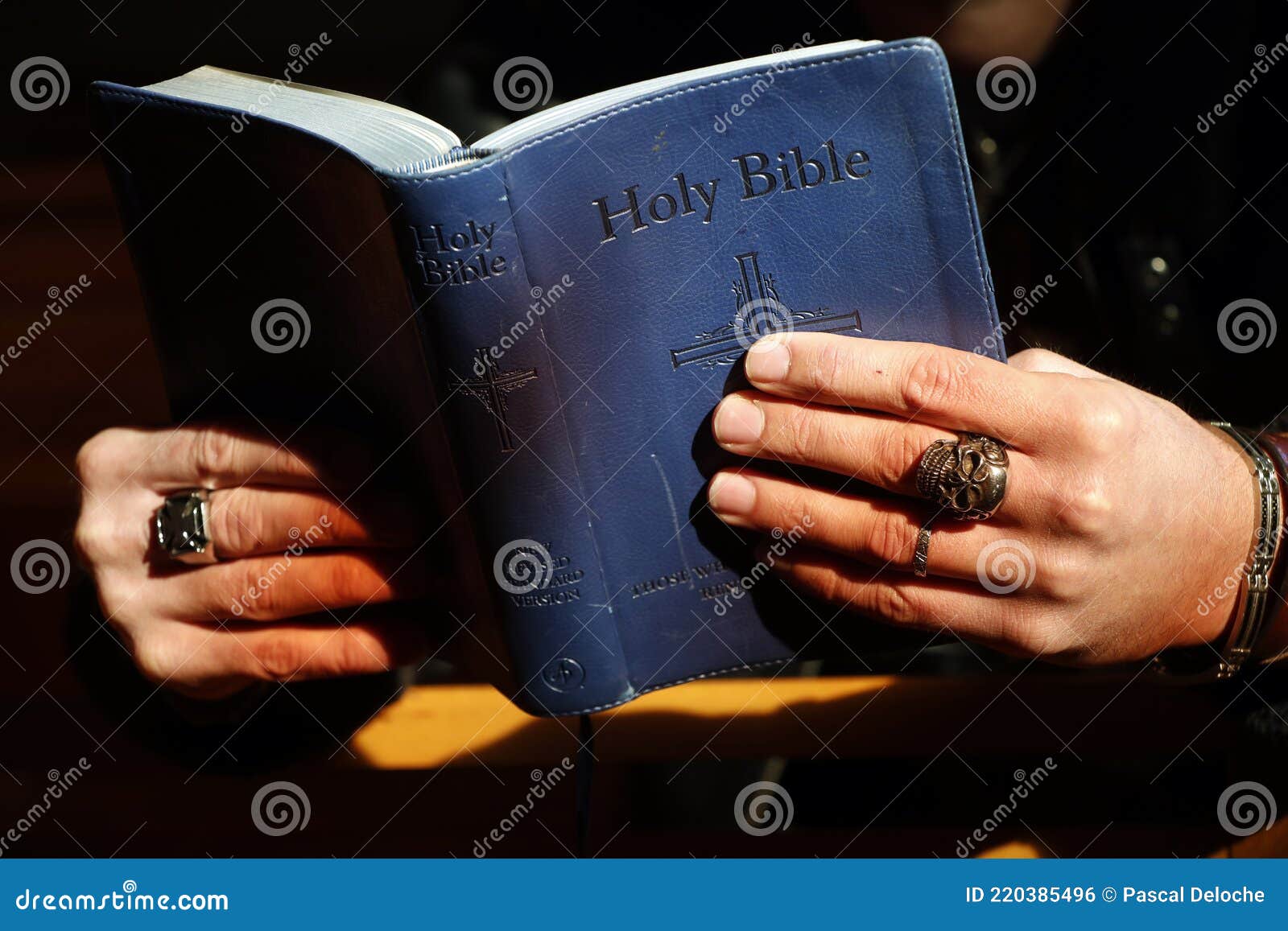 Man reading the bible editorial photo. Image of skull 220385496