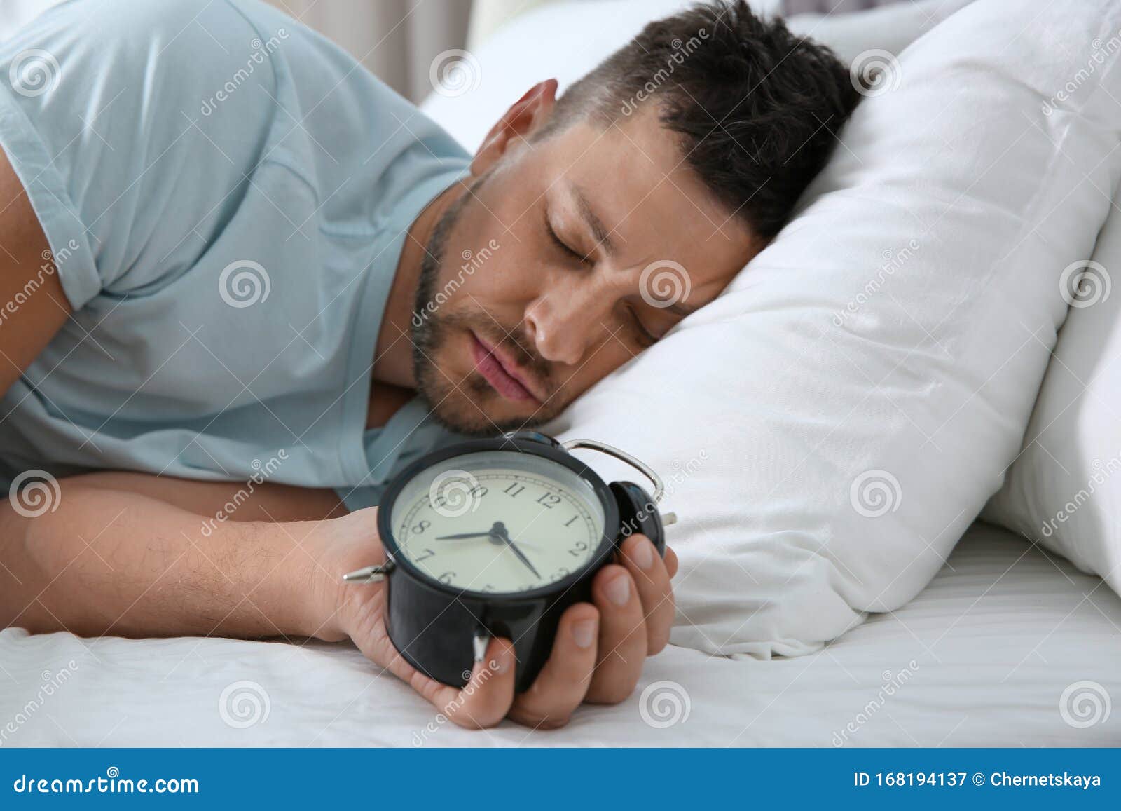 Man Sleeping With Alarm Clock At Home Stock Image Image Of Clock