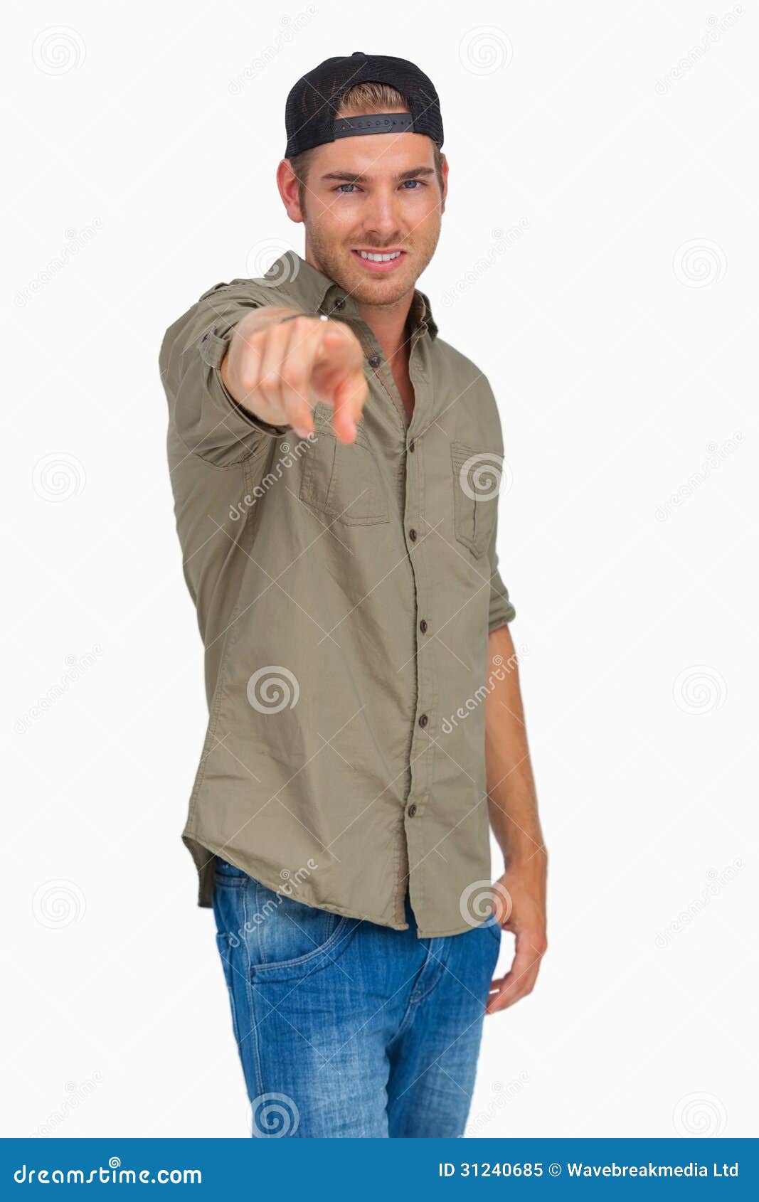 Man Smiling And Wearing Baseball Hat Backwards And Pointing Stock Image