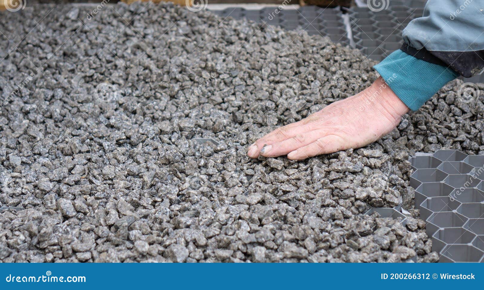 Man Smoothing Gravel with His Hands Stock Photo Image of human, tool