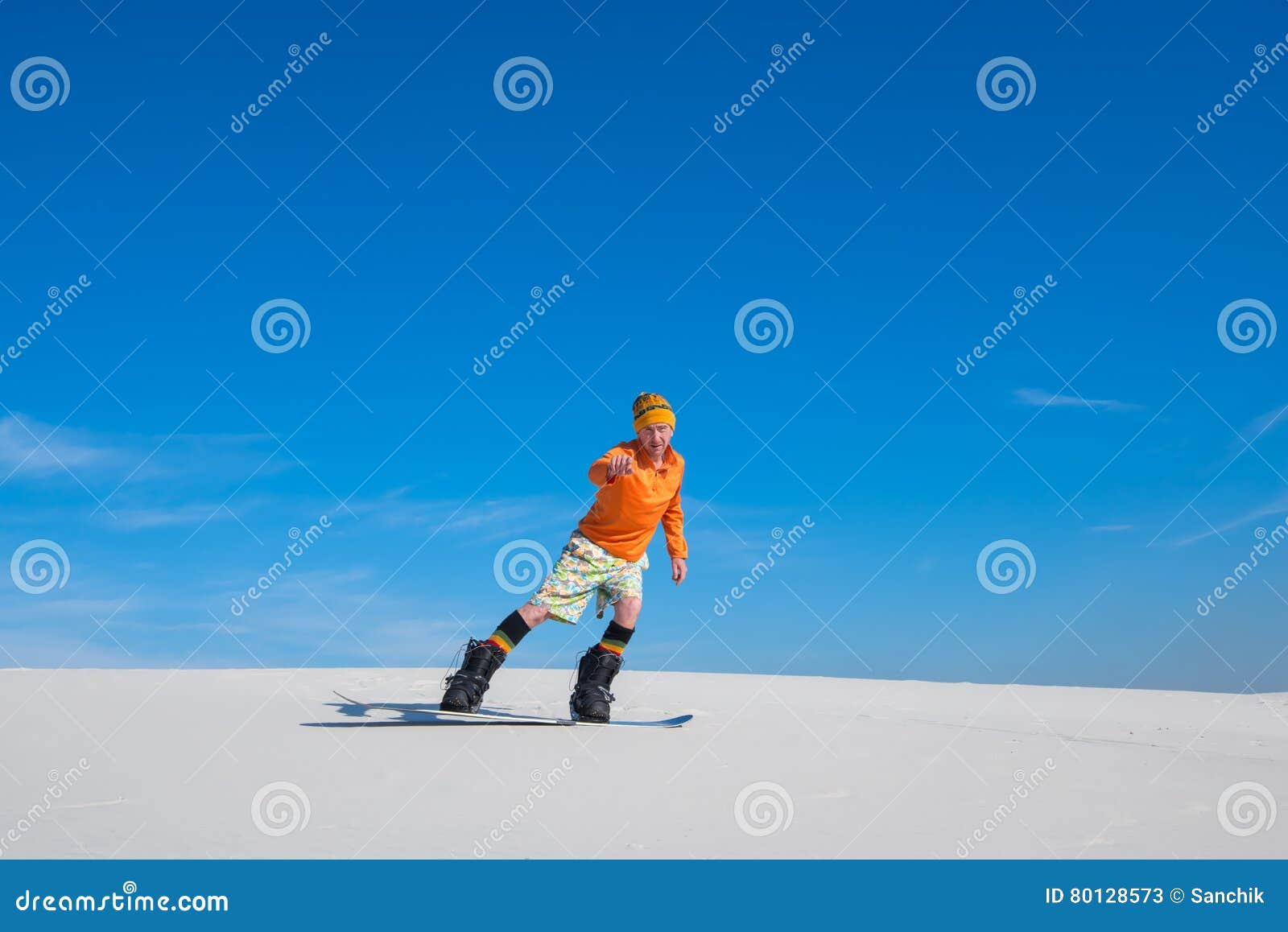 Man on Snowboard, Riding on Sand Slope. Stock Image - Image of ...