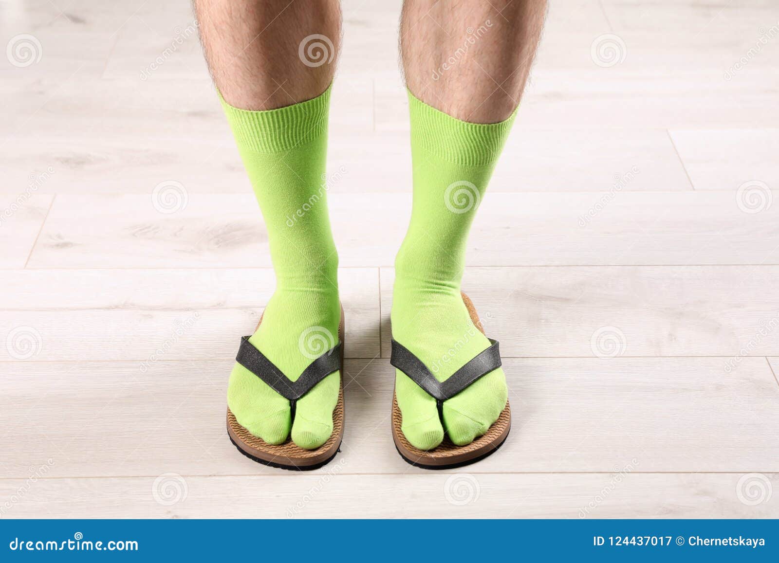 in Socks Slippers on Floor - Image of sandals, naff: 124437017