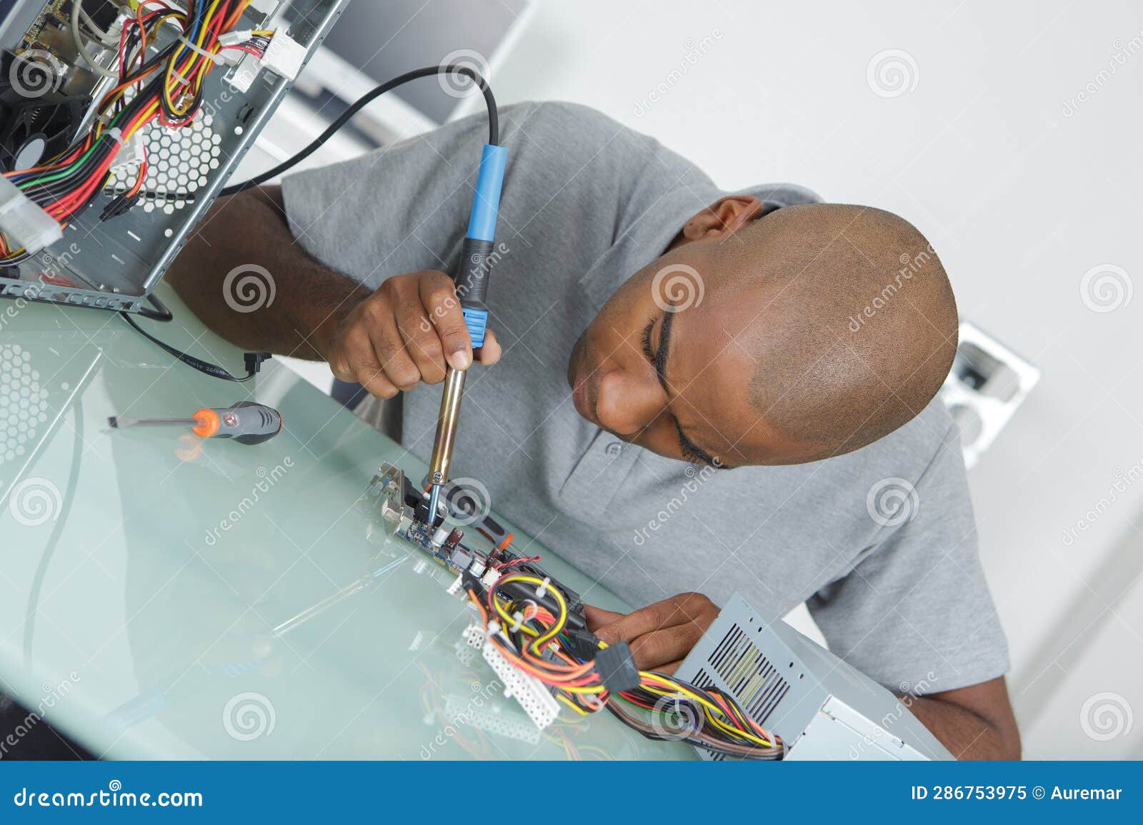 Man soldering pc stock image. Image of computer, technology 286753975