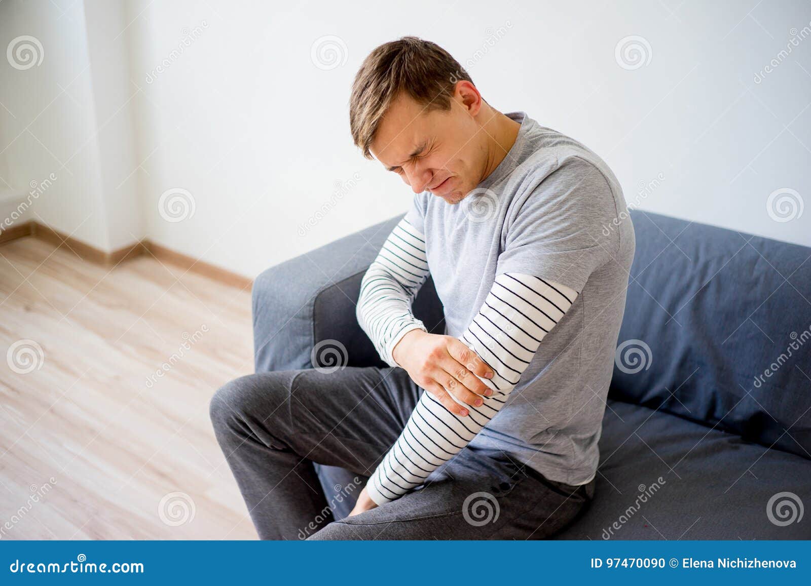 Man sprained his arm stock photo. Image of injury, medicine 97470090