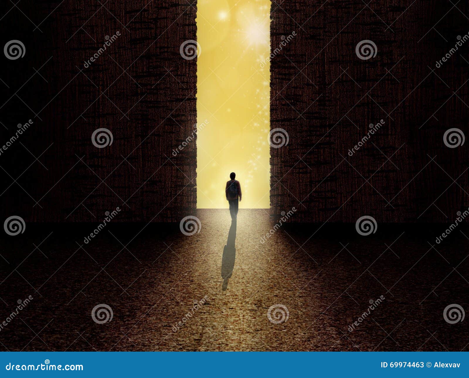 man standing on the border of darkness and light