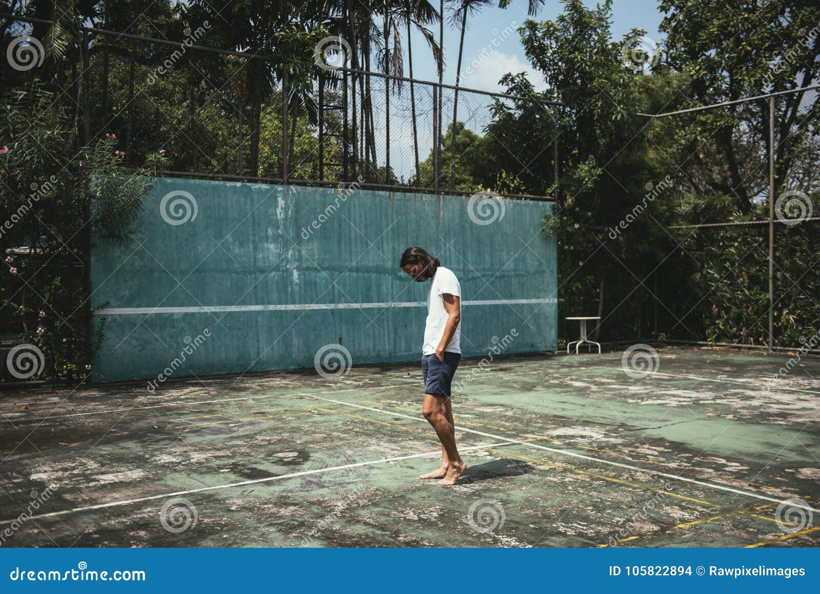 Man Standing in a Tennis Court Stock Photo Image of chic, tennis