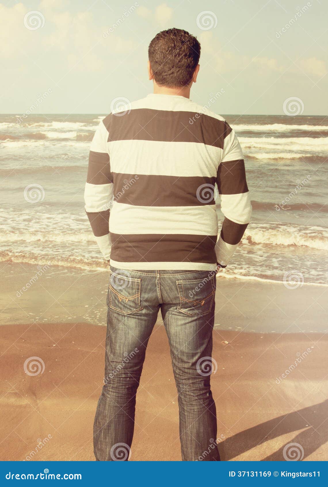 A Man Stands On The Sand Of Beach Stock Image Image Of Coast Horizon