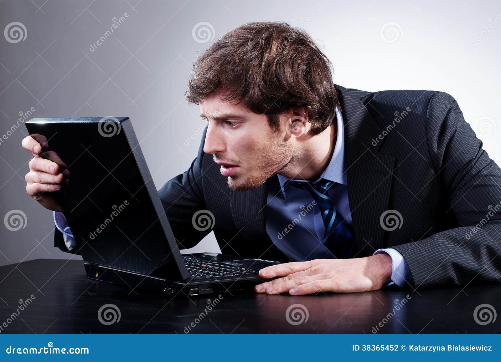 man staring at screen