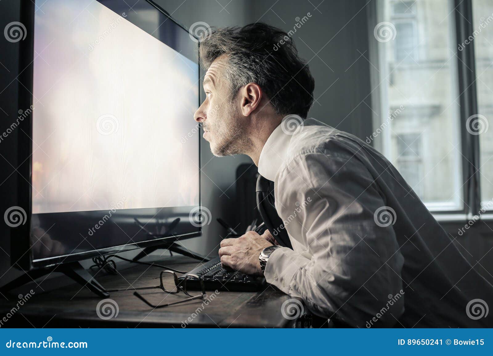 man staring at the screen