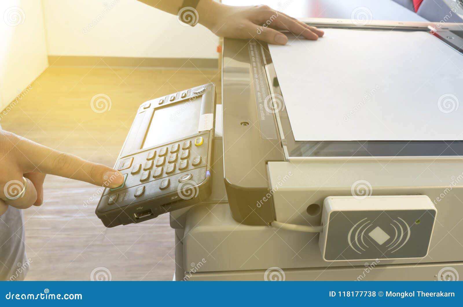 Man Photocopying, Scanning An Old Book On An Open Photocopier Home Printer Top View, Hand