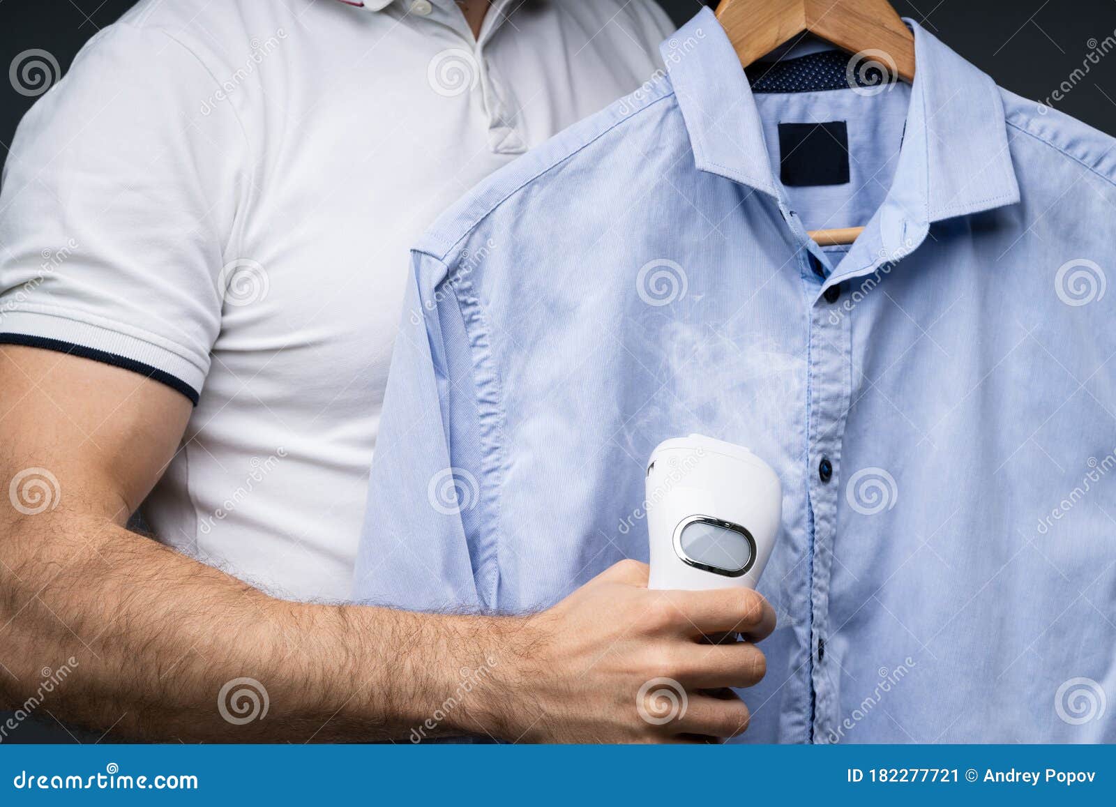 Man Steaming Shirt Using Electric Steamer Stock Image Image of