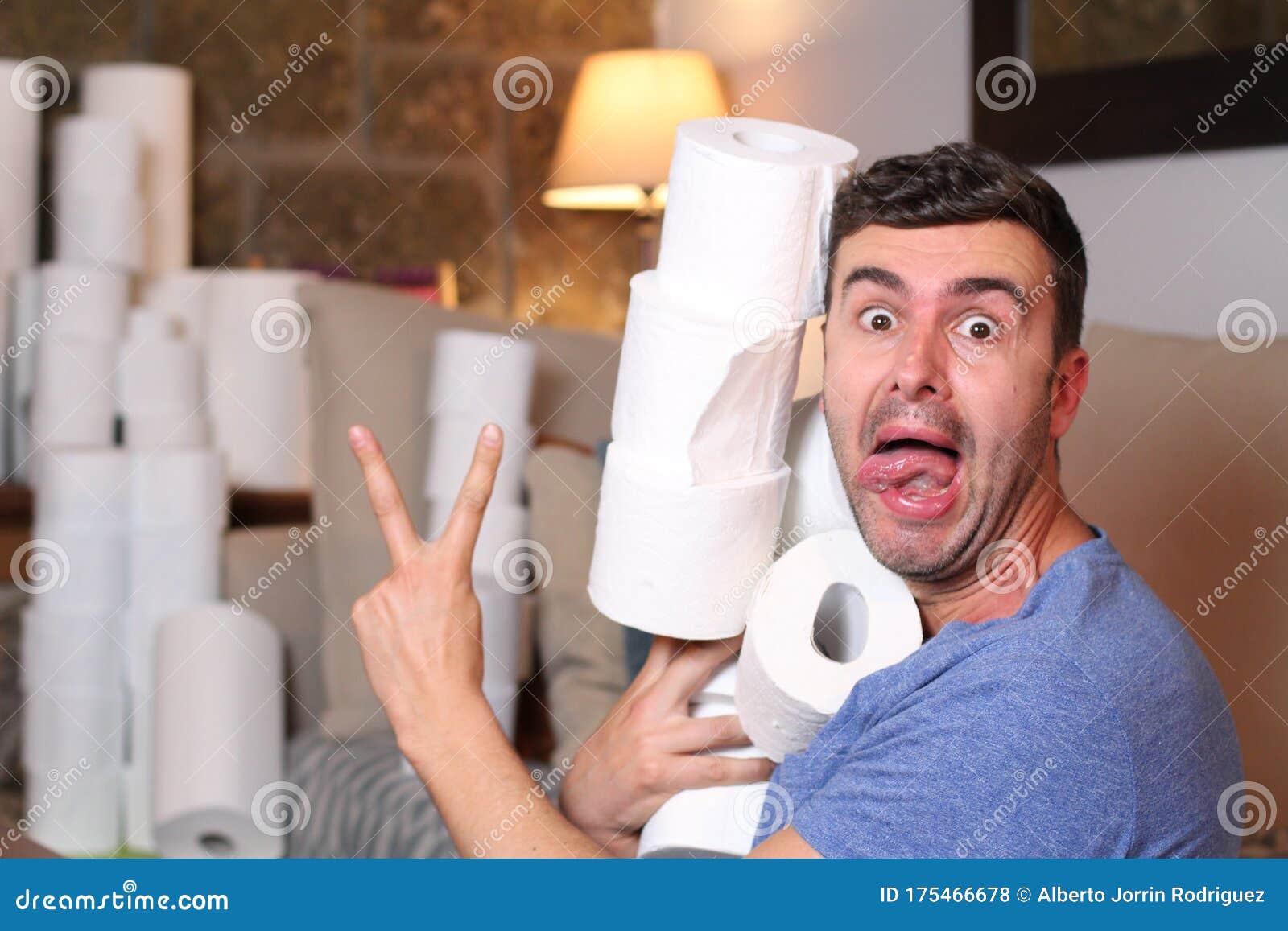Man Stocking Up Toilet Paper at Home Stock Photo Image of paper, care