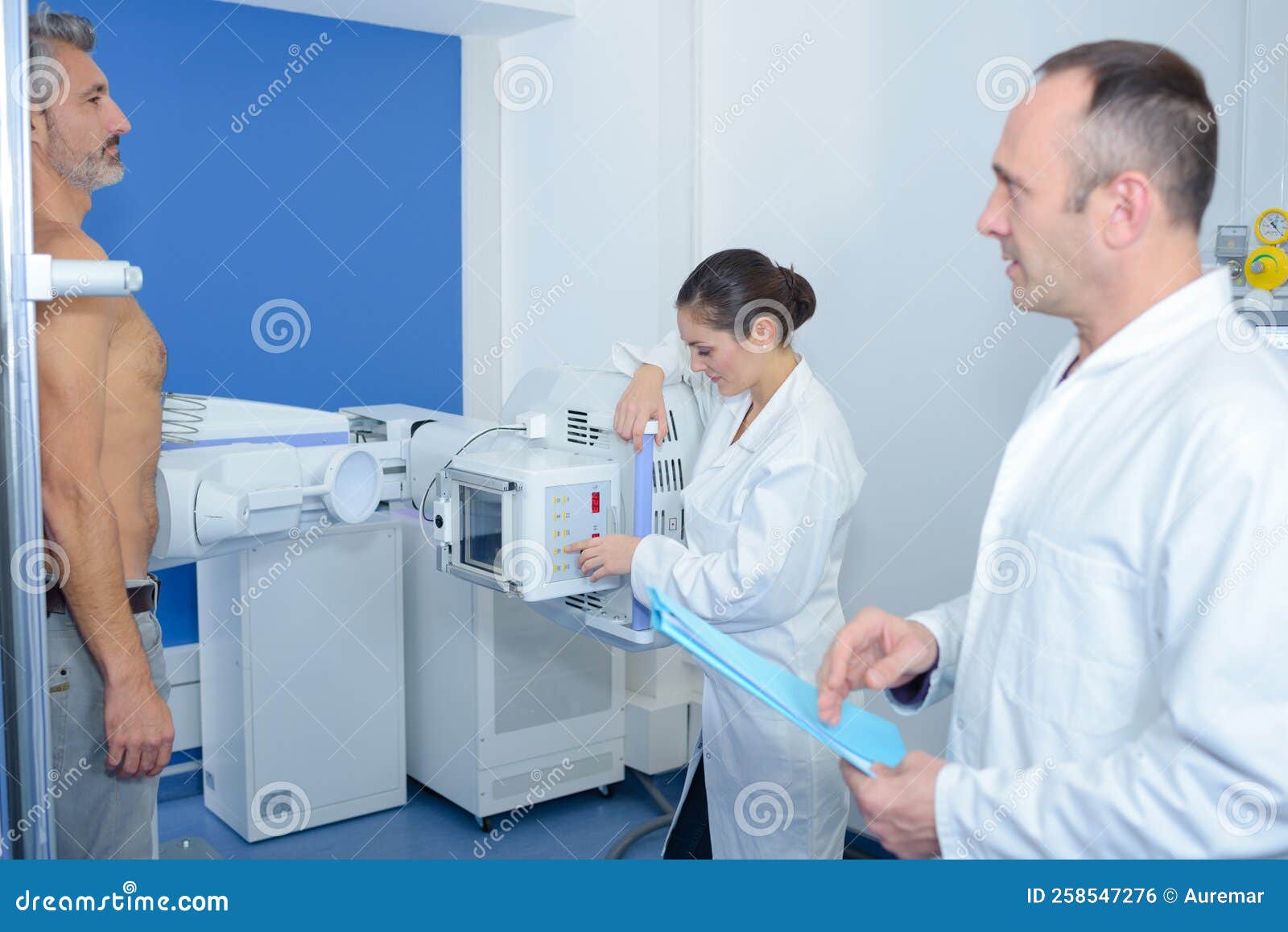Man Stood Upright Having Xray Stock Photo Image of equipment, uniform