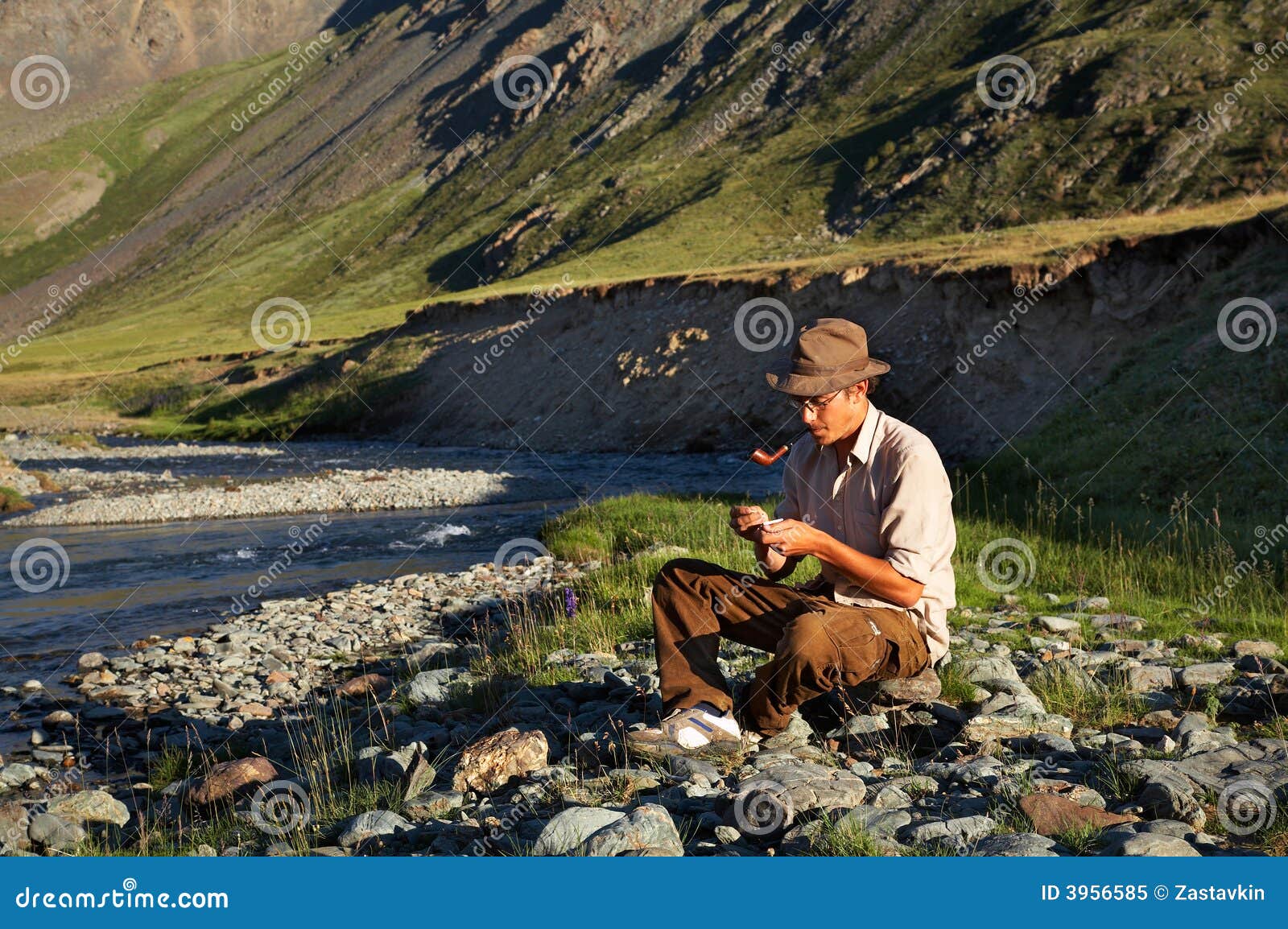 Man the stream stock image. Image of mountains, person - 3956585