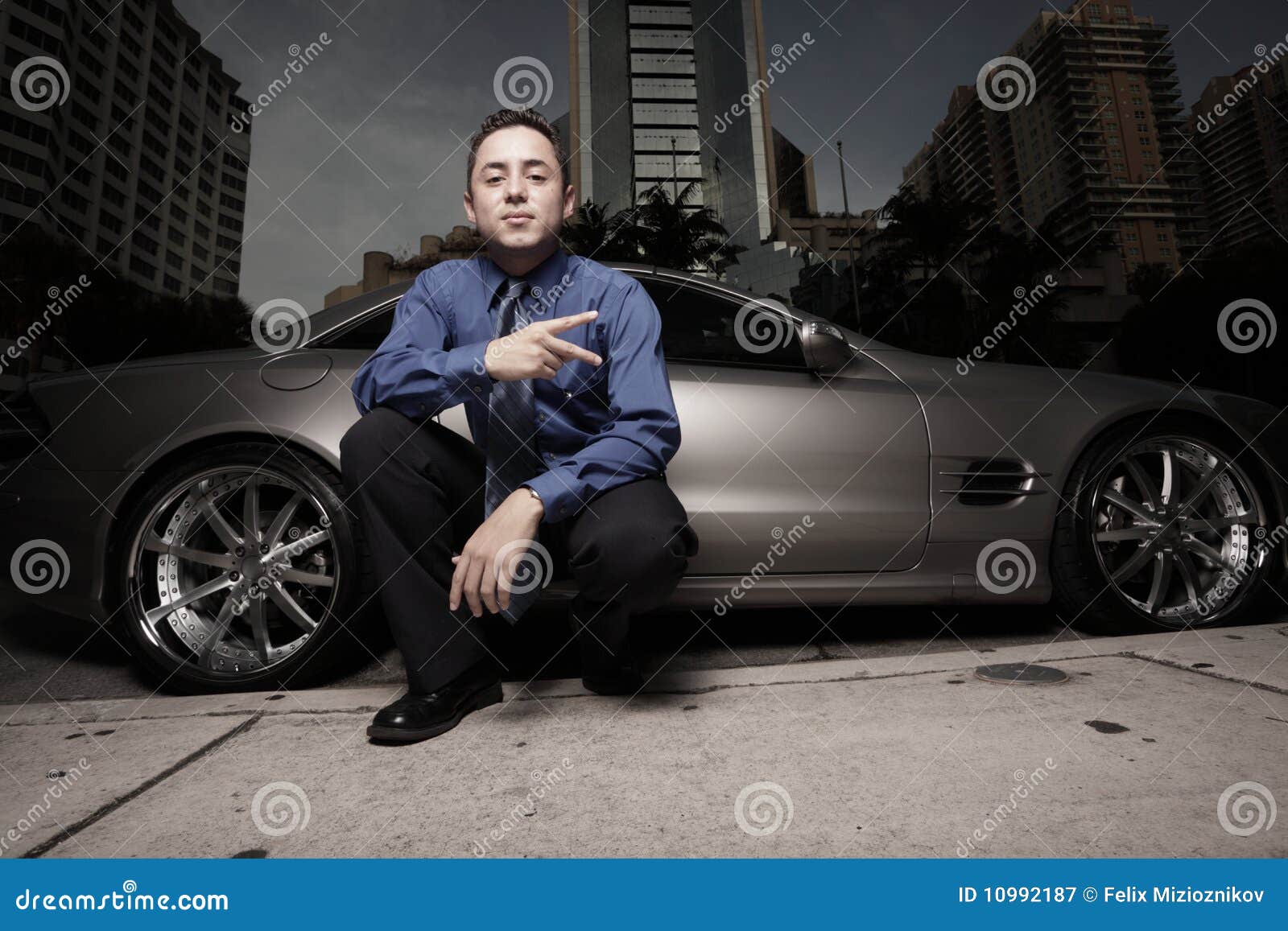 A Man Wearing Beside the Car · Free Stock Photo